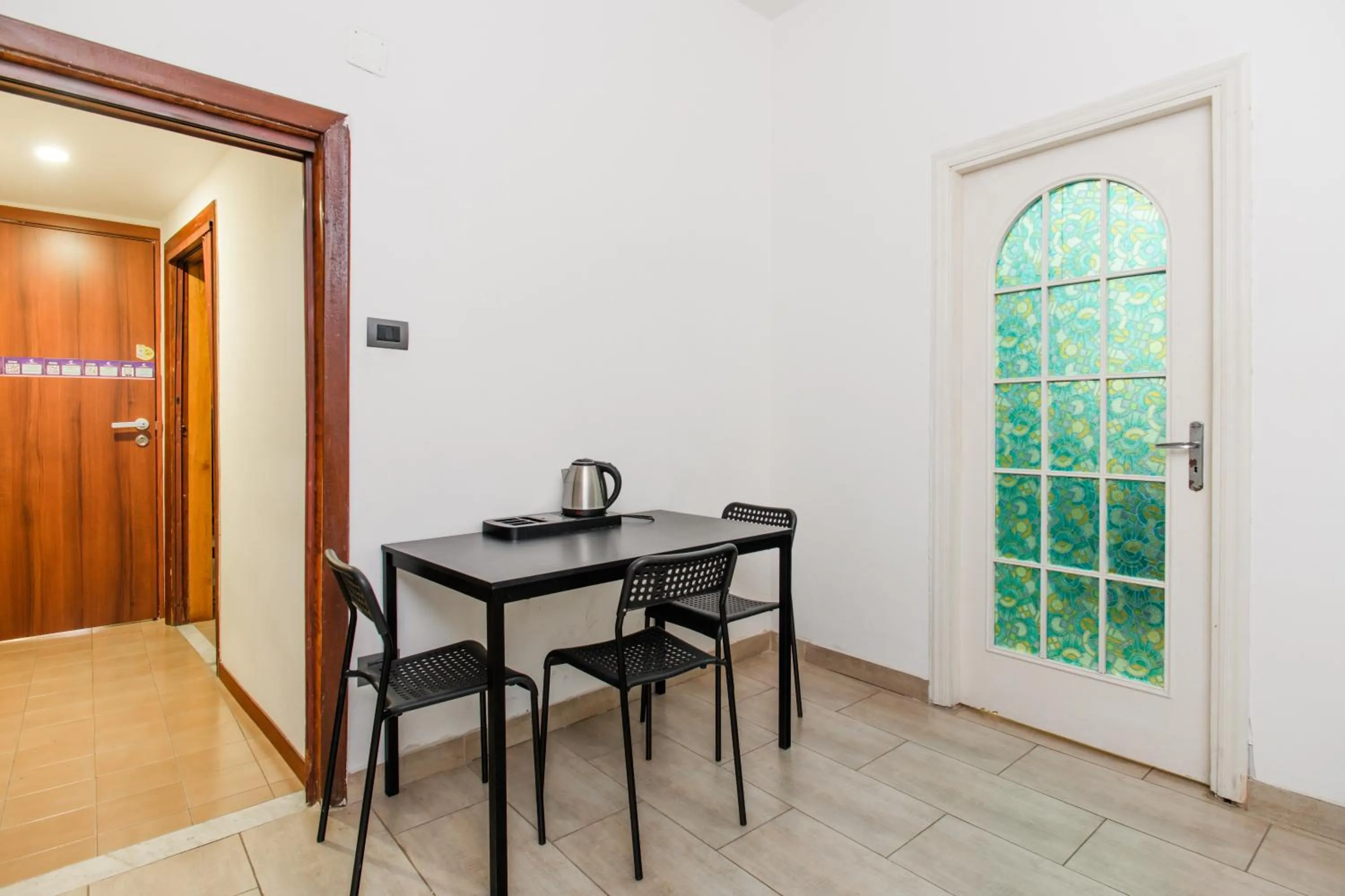Dining area in Inside Chiaia Rooms