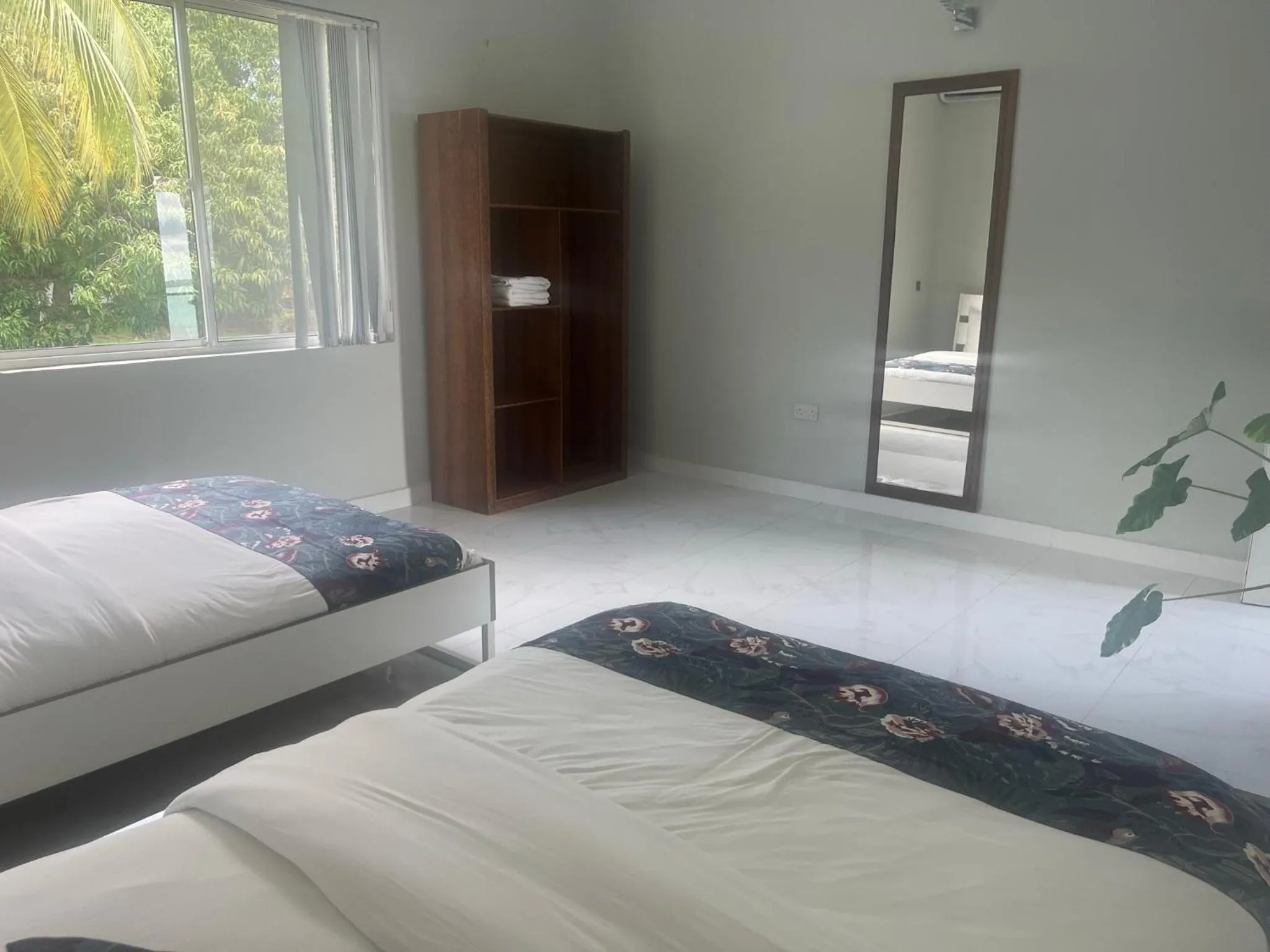 Bed in Calamari Beach Resort