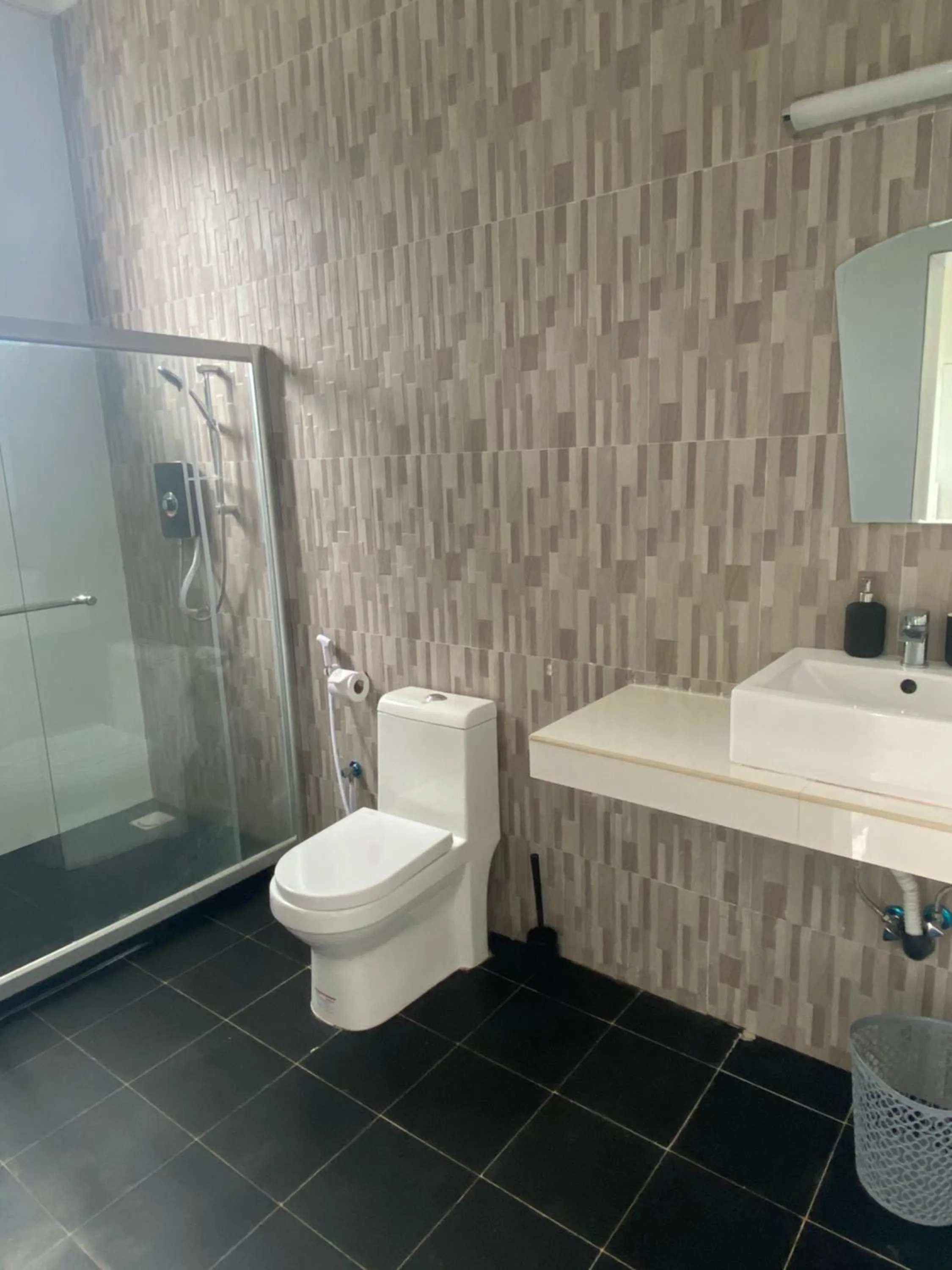 Bathroom in Calamari Beach Resort