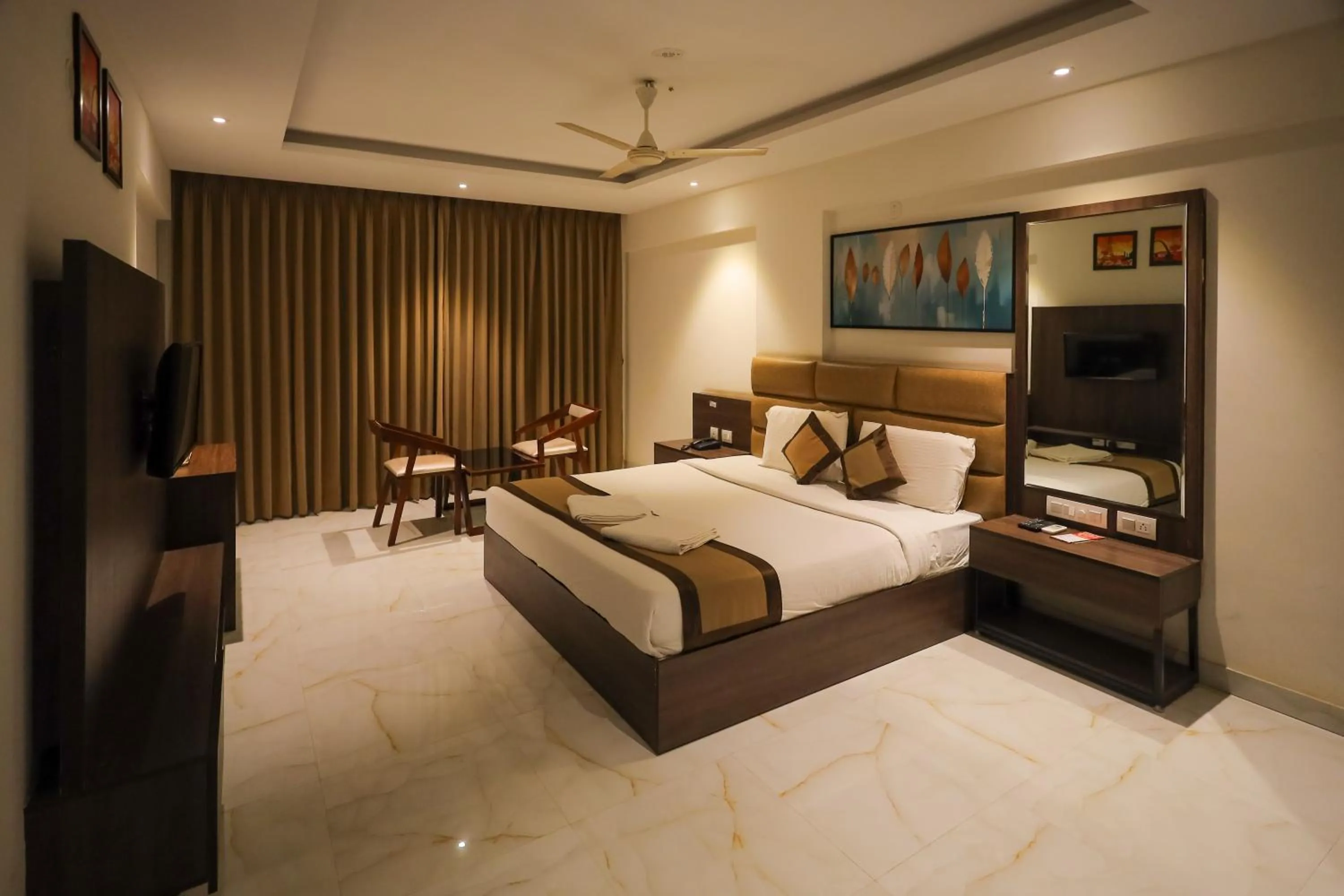 Bedroom, Bed in Adyar Plaza Inn by RAK Rooms, Mangaluru