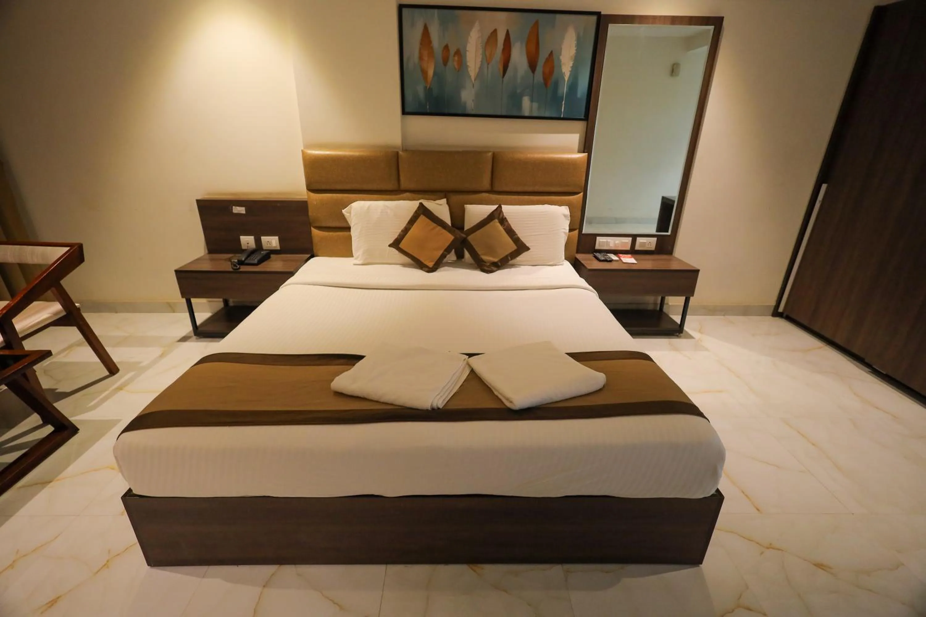 Bed in Adyar Plaza Inn by RAK Rooms, Mangaluru
