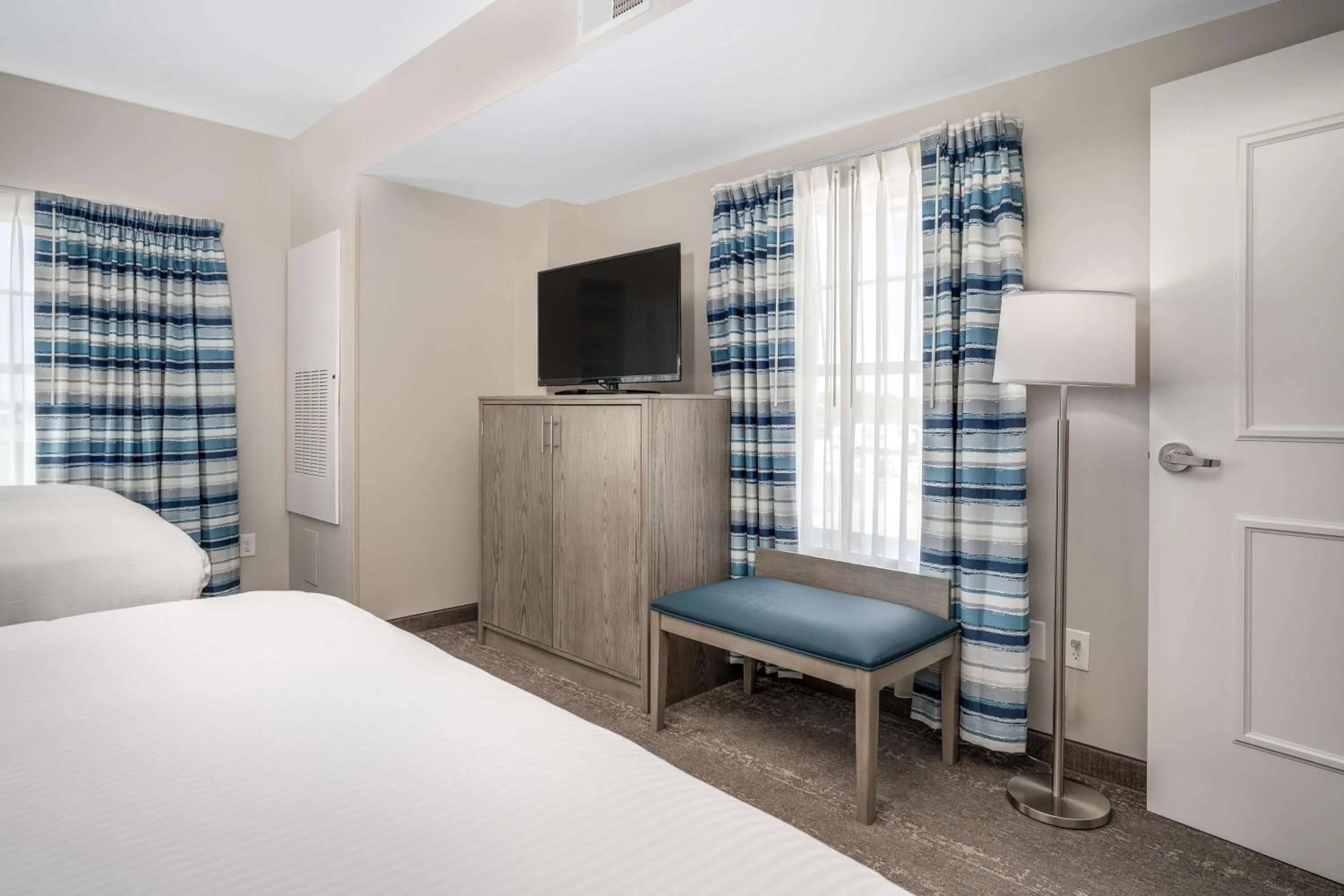 Photo of the whole room, Bed in Lighthouse Suites - Best Western Signature Collection