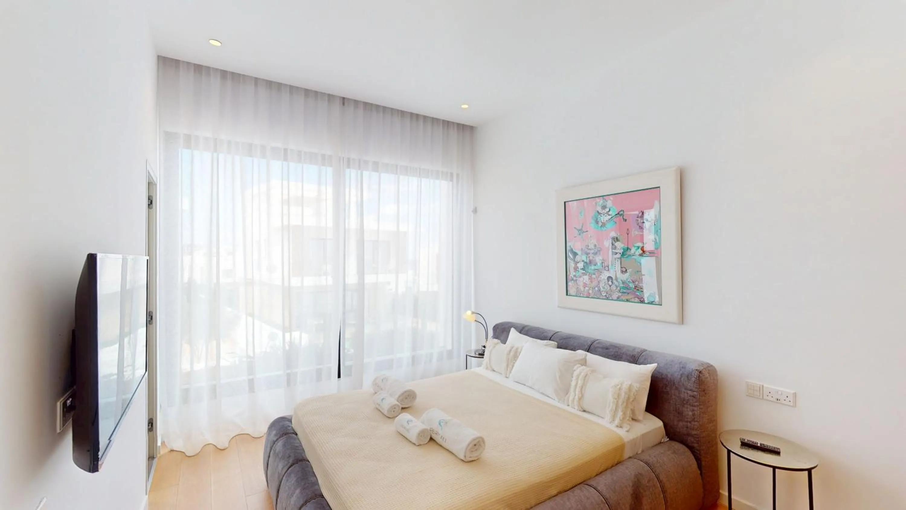 Bed in Periyiali Konnos Villas Beach Resort