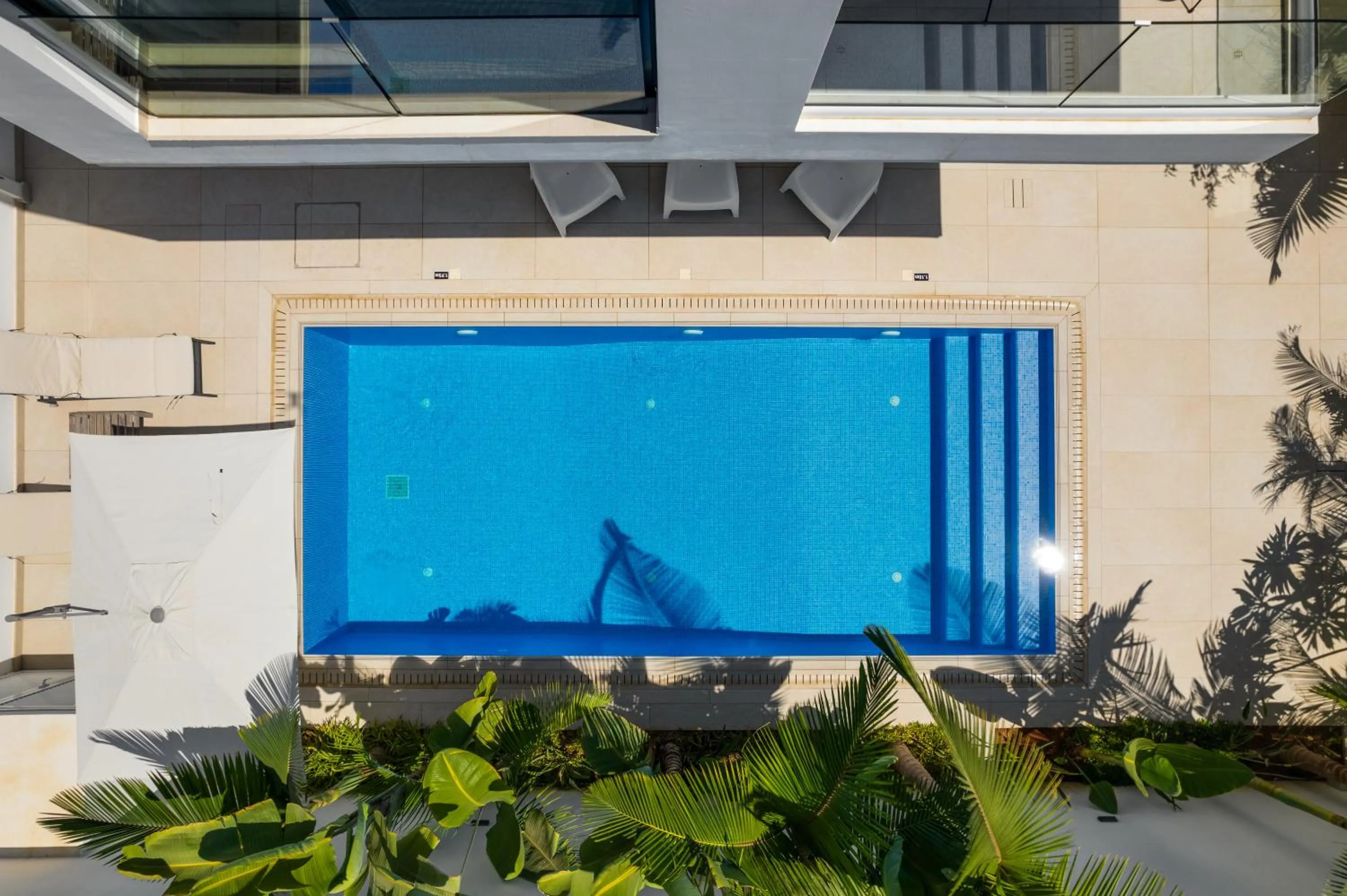 Swimming pool in Periyiali Konnos Villas Beach Resort