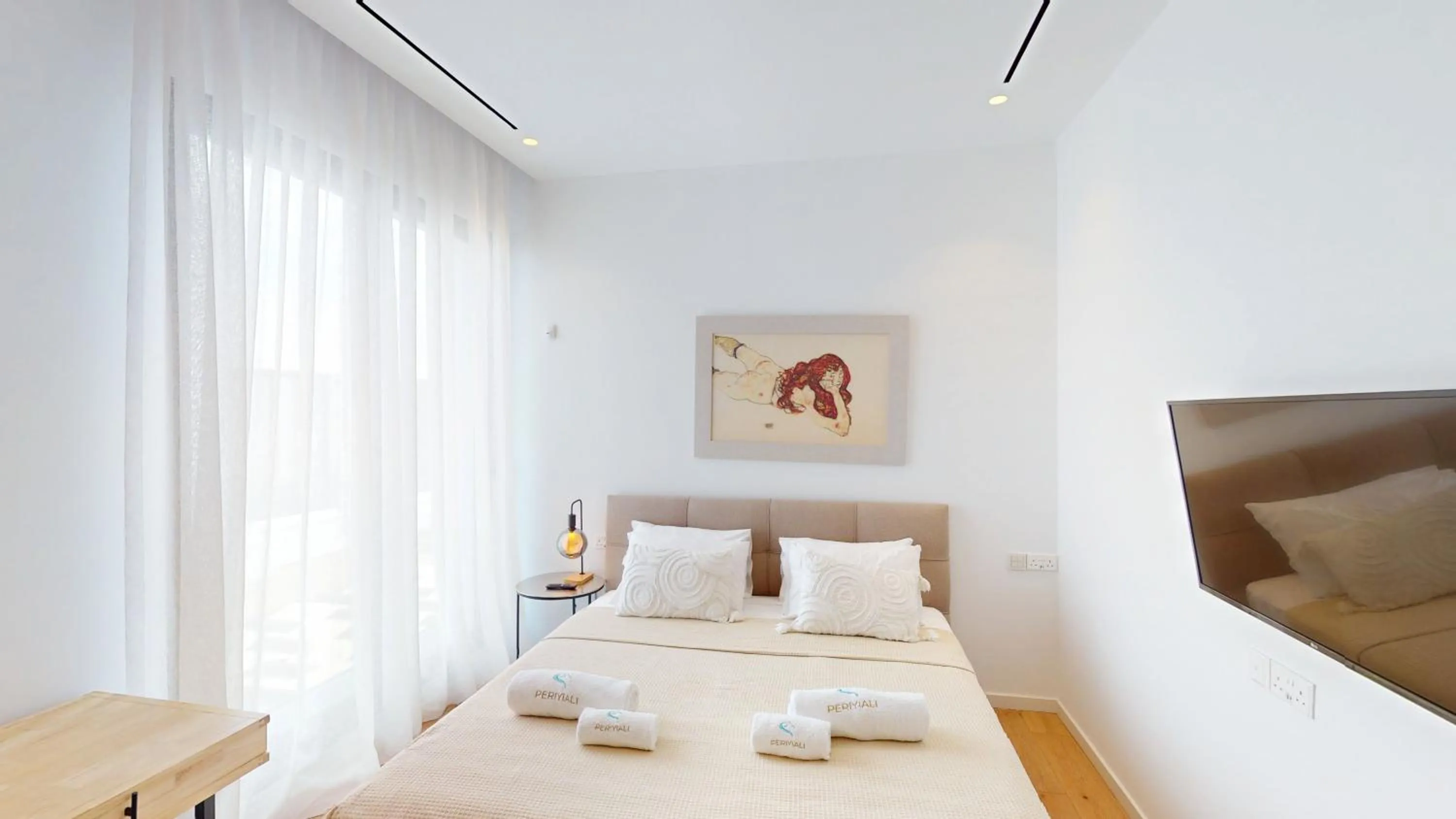 Bed in Periyiali Konnos Villas Beach Resort