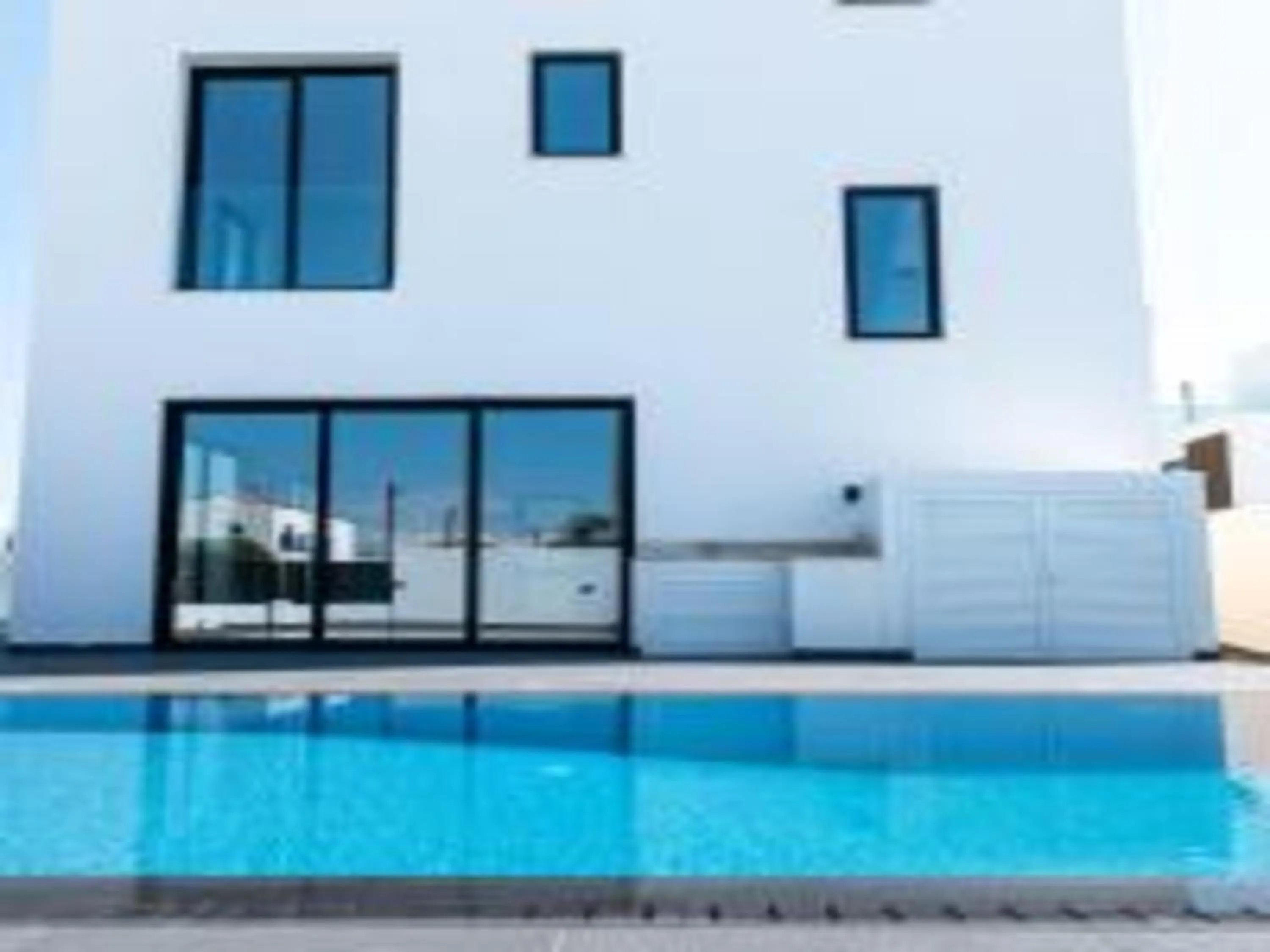 Swimming pool in Periyiali Konnos Villas Beach Resort
