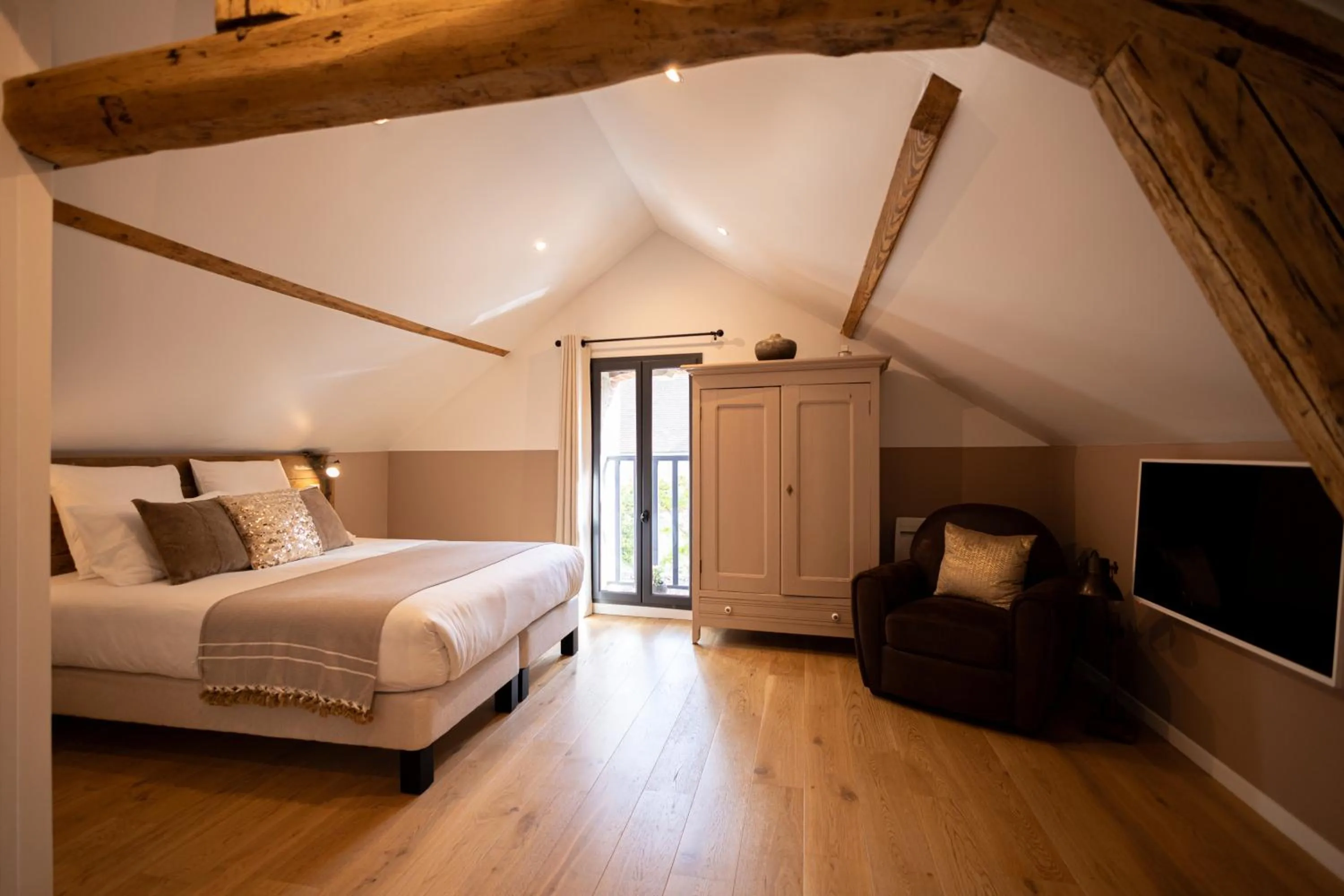 Bed in L'Atelier des Magnolias