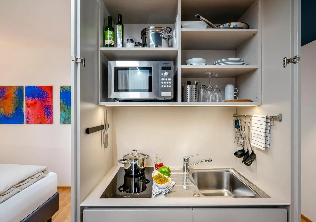 Kitchen or kitchenette in Boutique Hotel Hauser