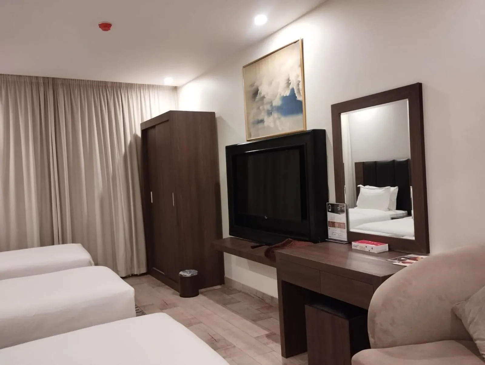 Bed in Olive Tree Hotel