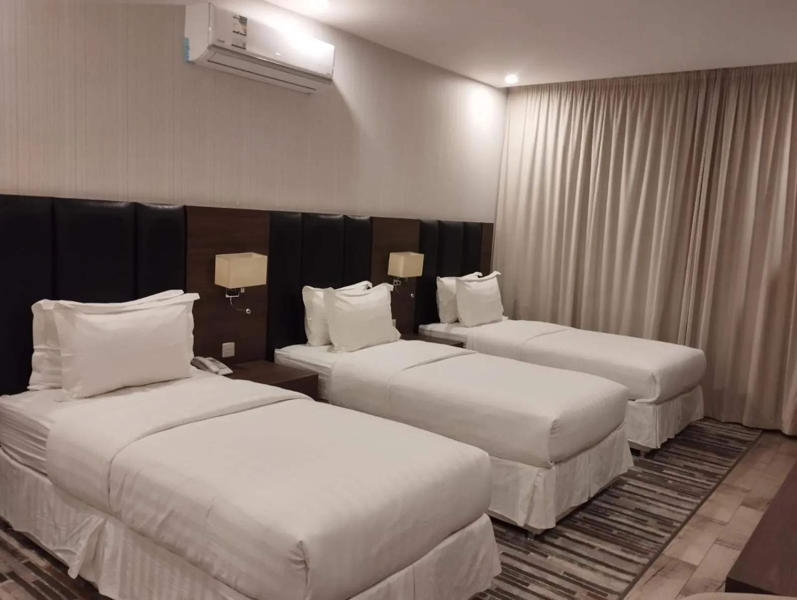 Bed in Olive Tree Hotel