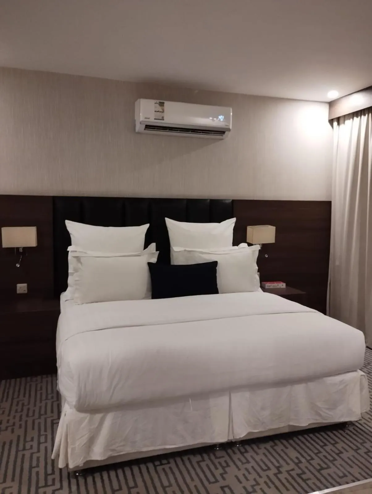 Bed in Olive Tree Hotel