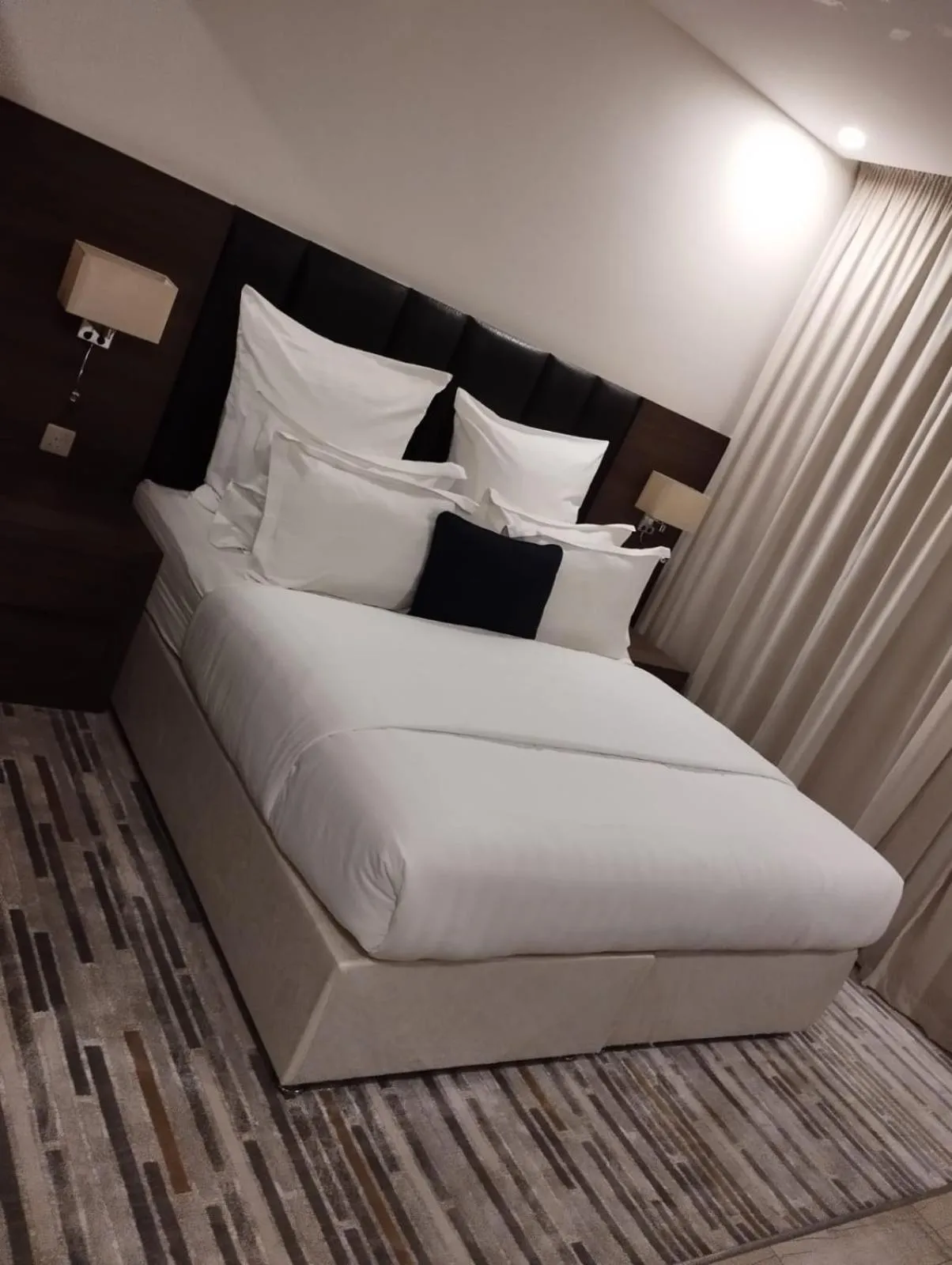 Bed in Olive Tree Hotel