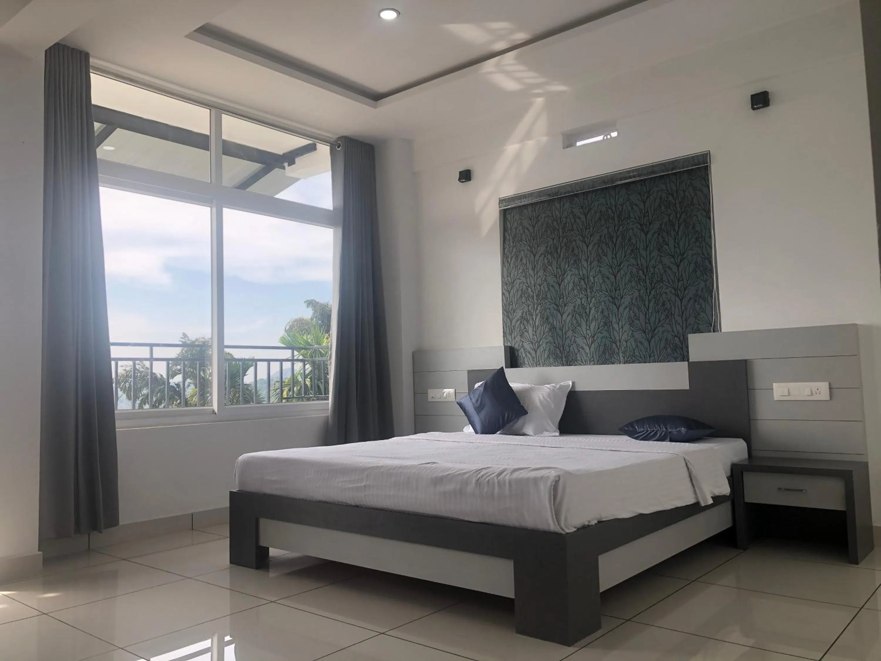 Bed in Raveendra Inn