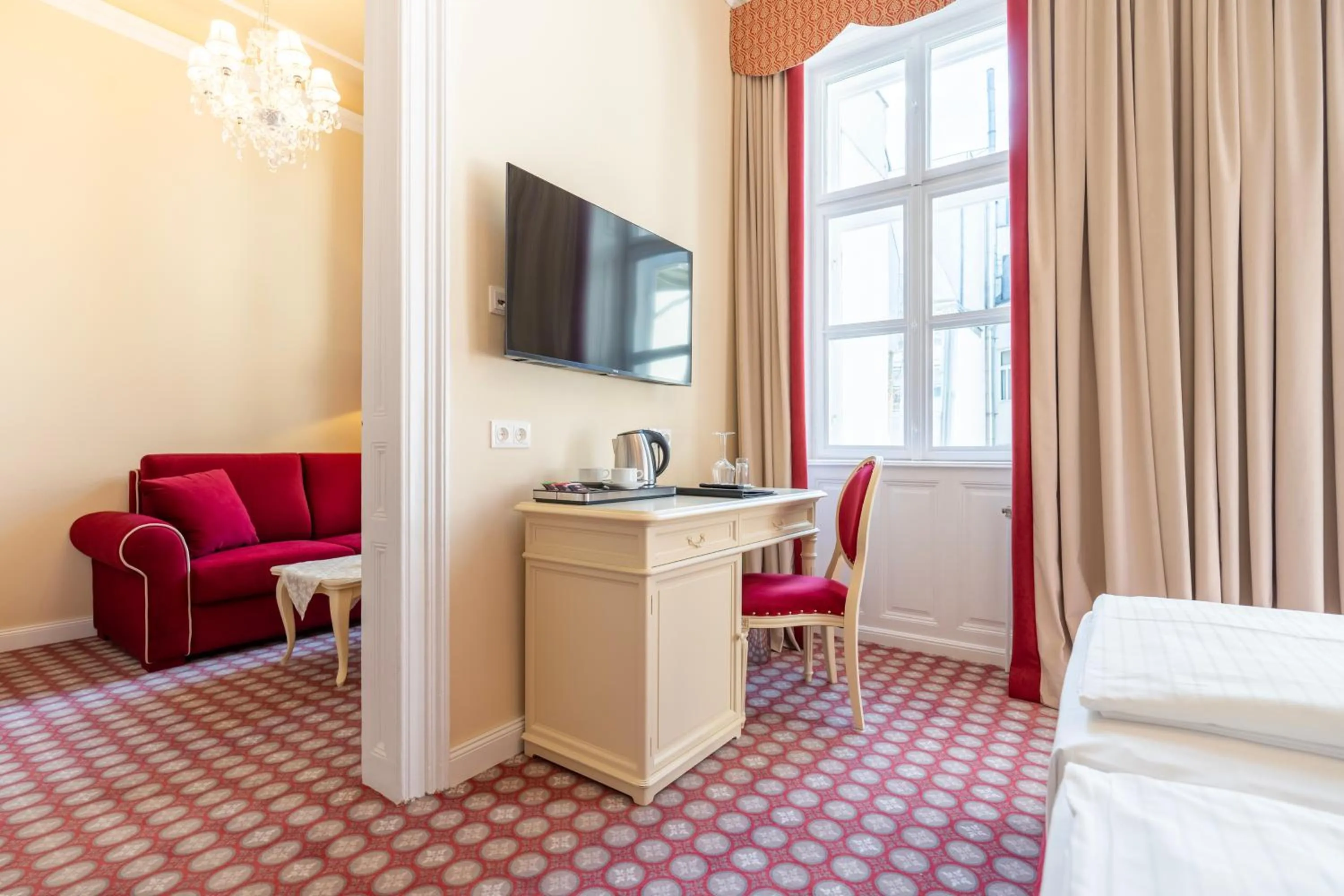 Photo of the whole room, Bed in Aviano Boutique Hotel