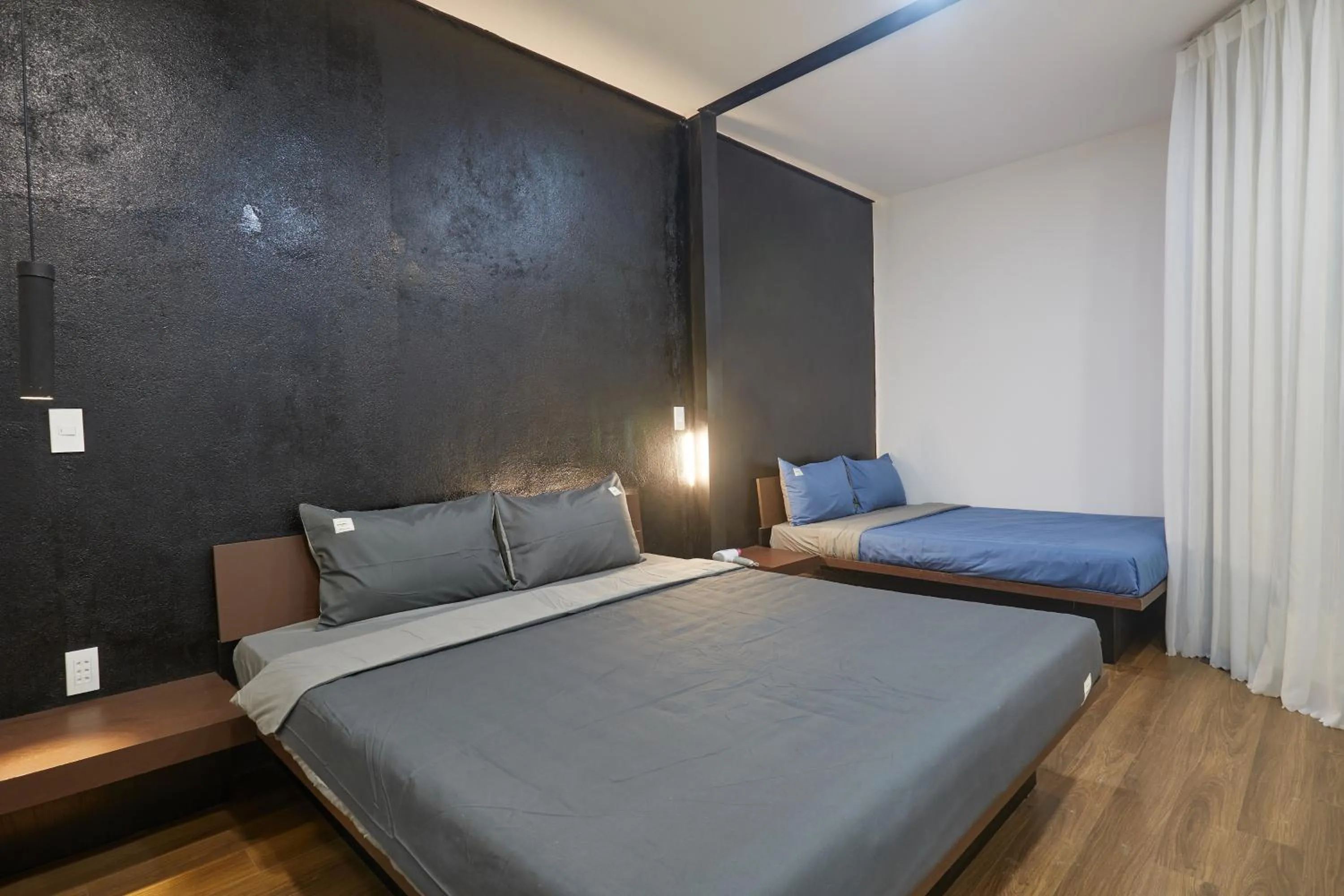 Bed in The Garden Capsule Hotel