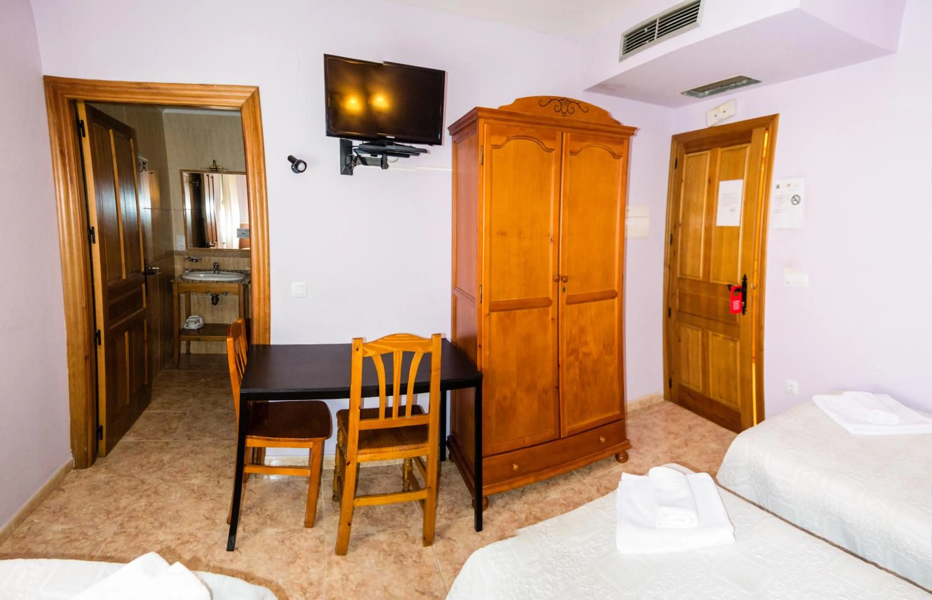 Bed in El Roble Hotel Restaurante