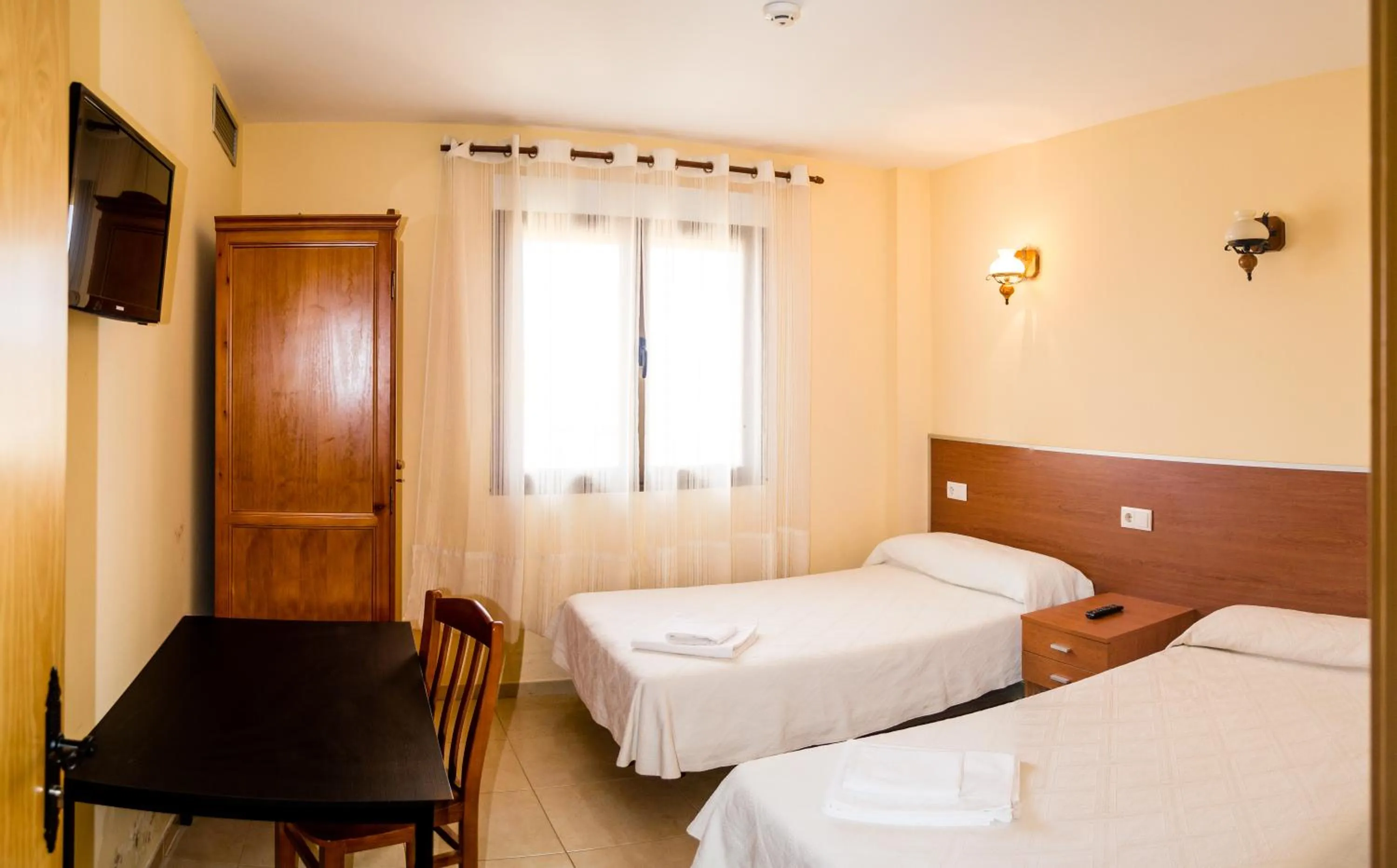 Bed in El Roble Hotel Restaurante