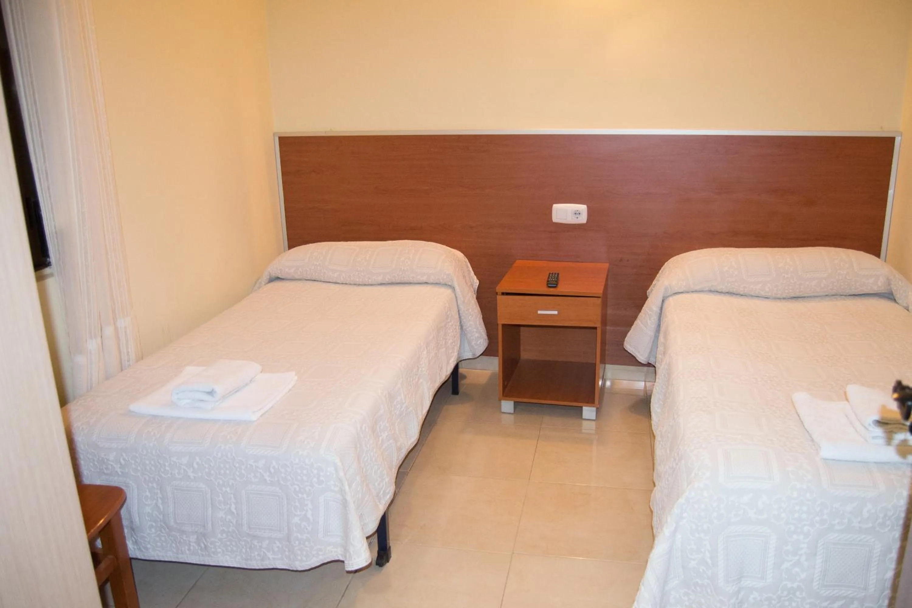 Bed in El Roble Hotel Restaurante