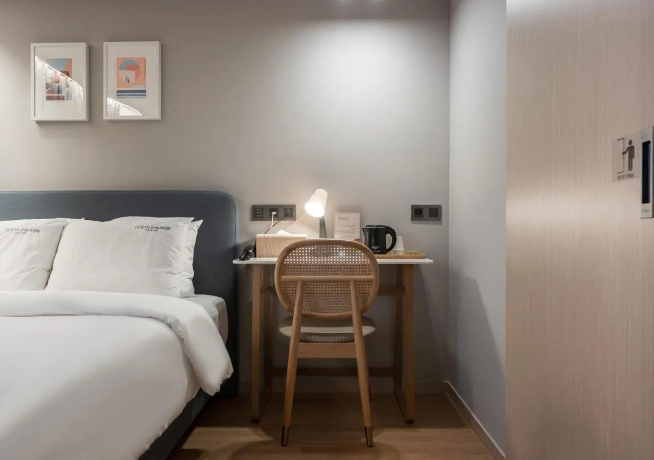 Seating area, Bed in Nampo Ocean2Heaven Hotel& Spa