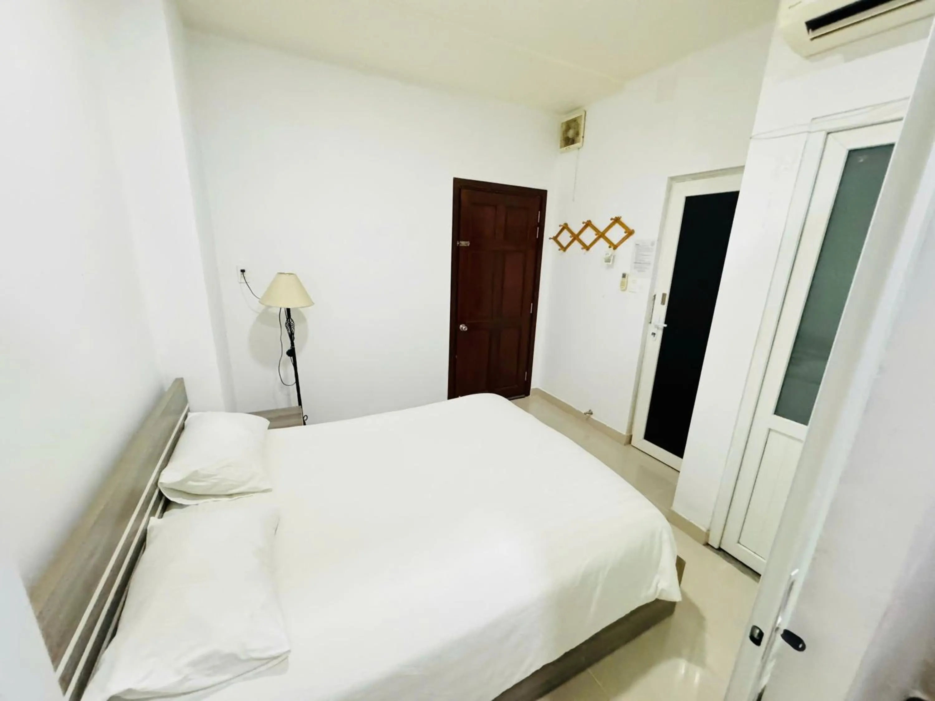 Bedroom, Bed in EMERALD APARTMENTS