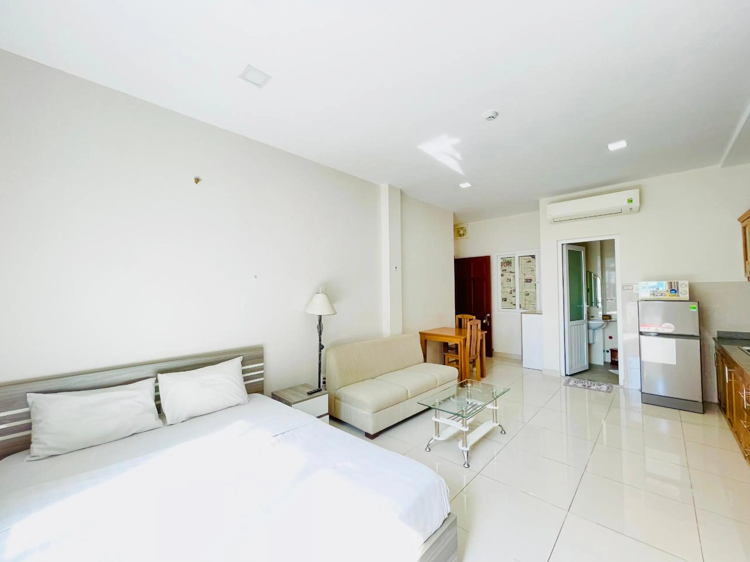 Bed in EMERALD APARTMENTS