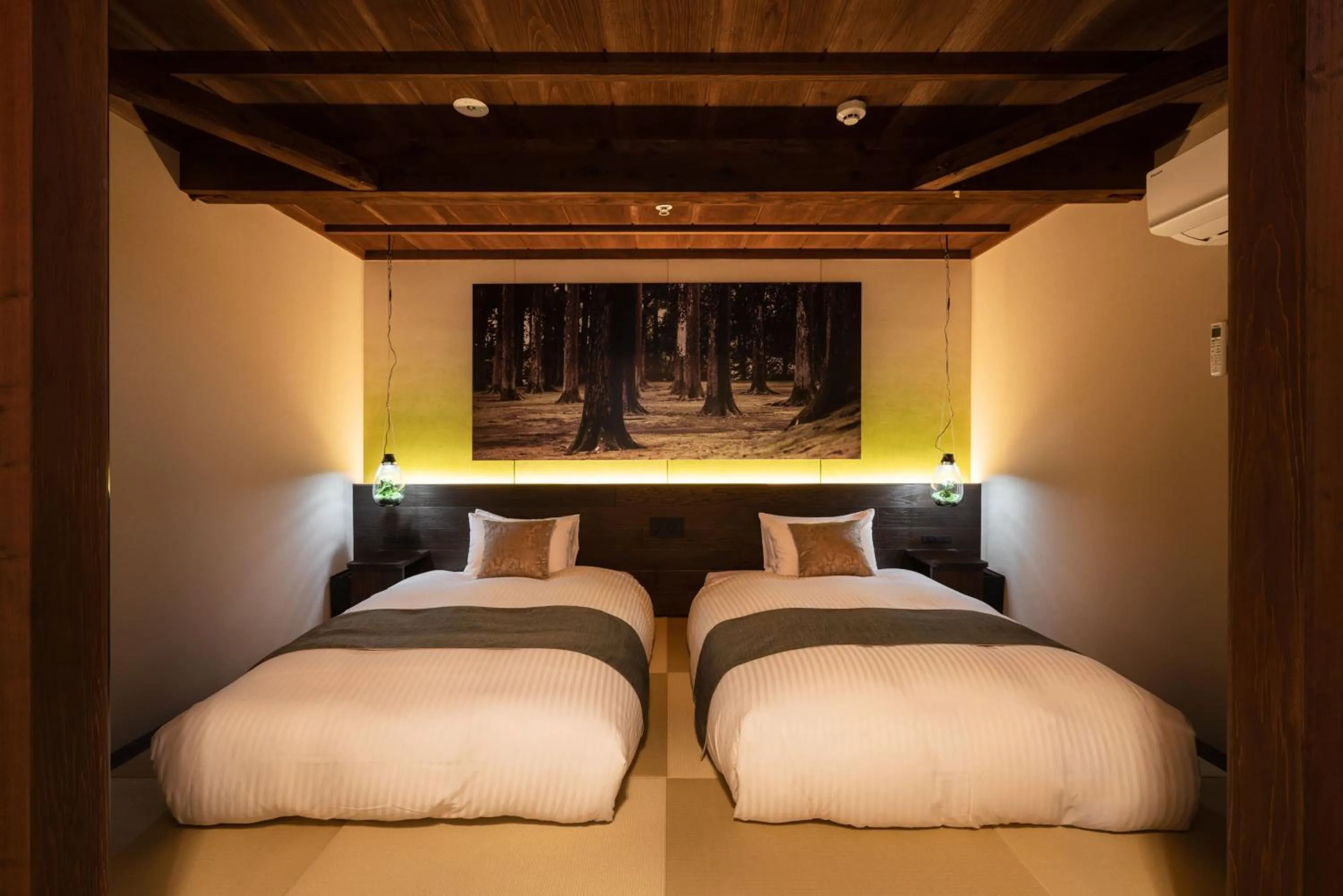 Bed in Nazuna Obi Onsen Resort