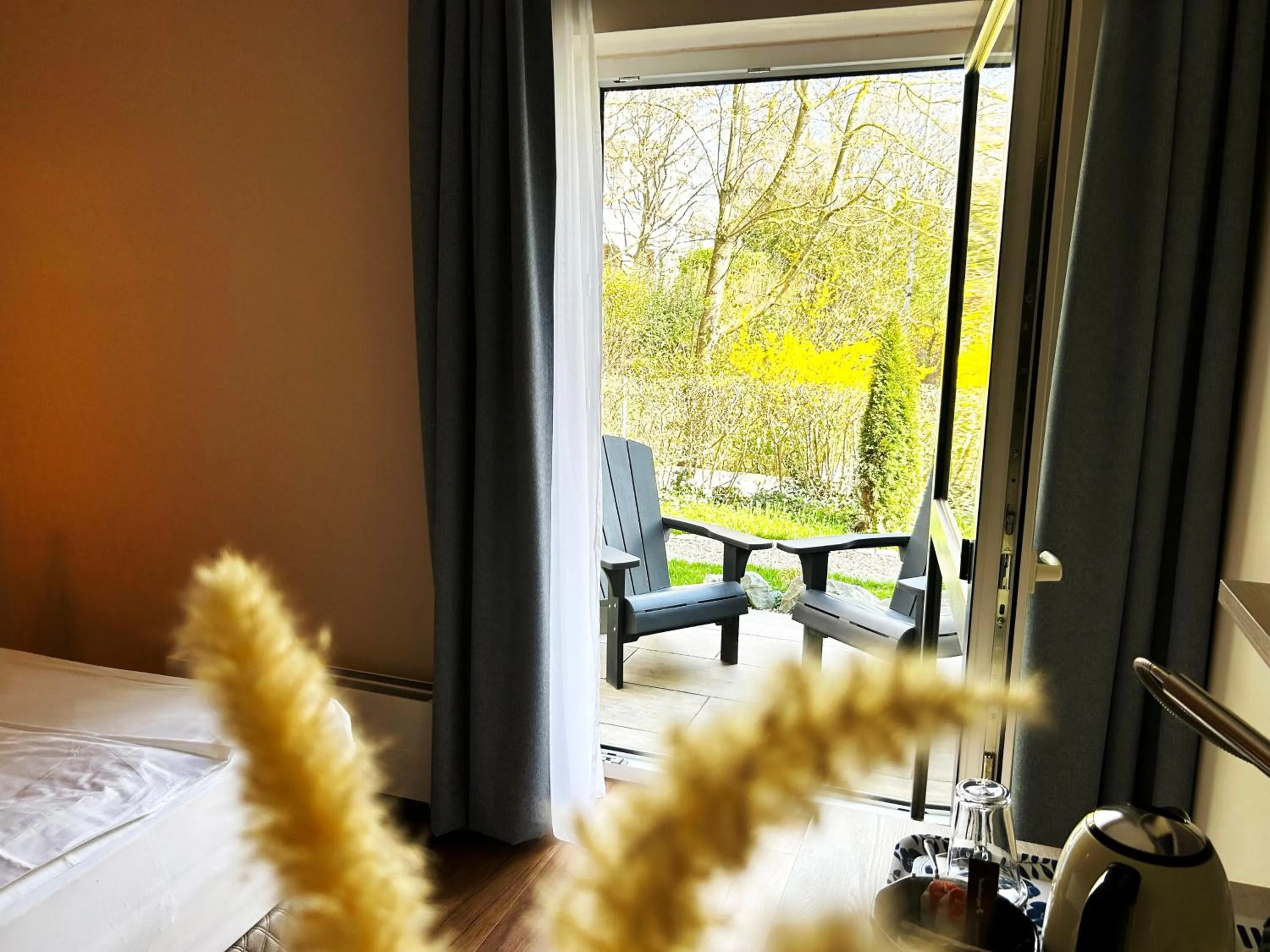 Balcony/Terrace, Bed in Safranberg Hotel & Sauna