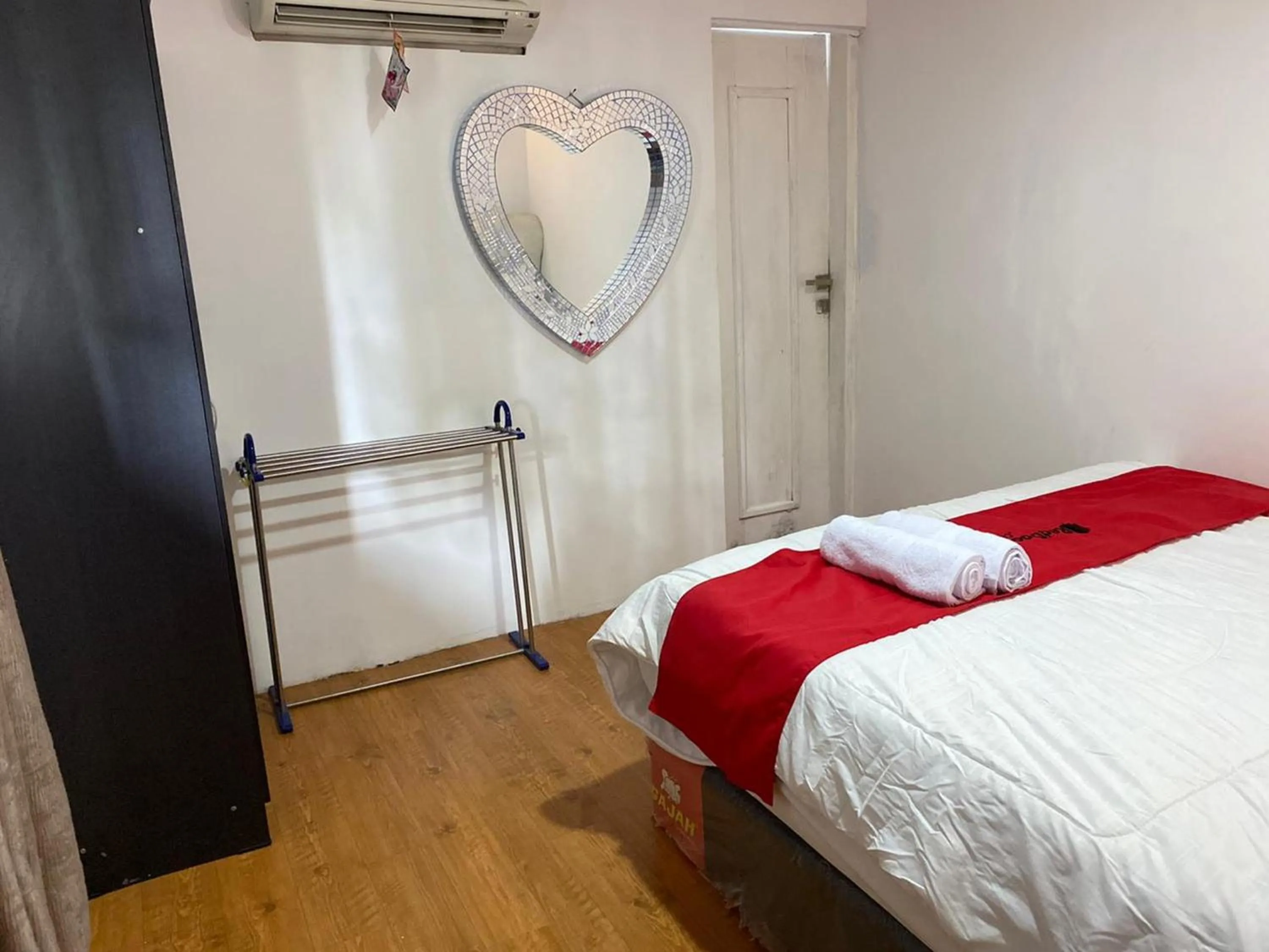 Bed in RedDoorz Plus at Puncak Mas Cottage Lampung