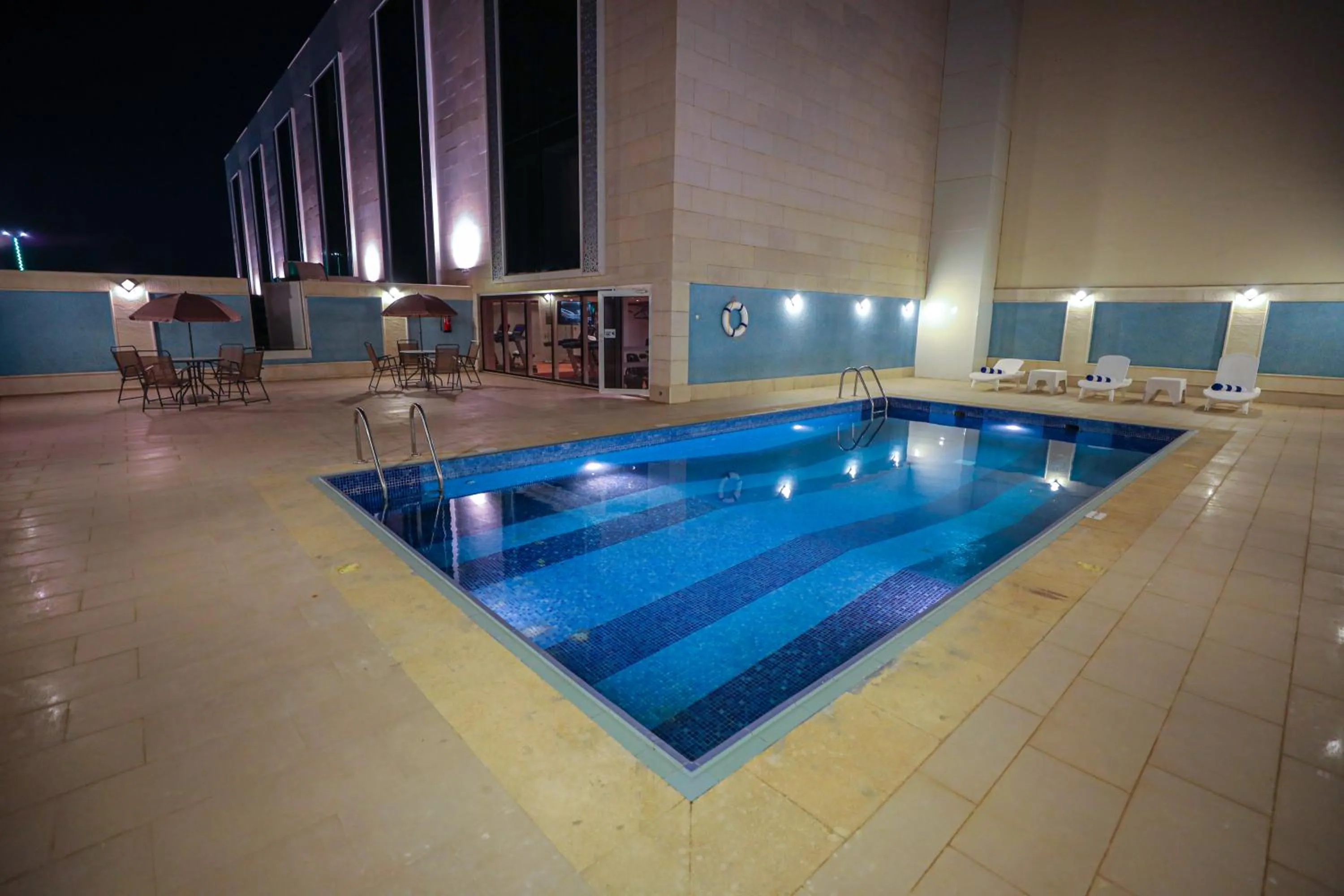 Swimming pool in Cheerful Al Waha Unayzah Hotel