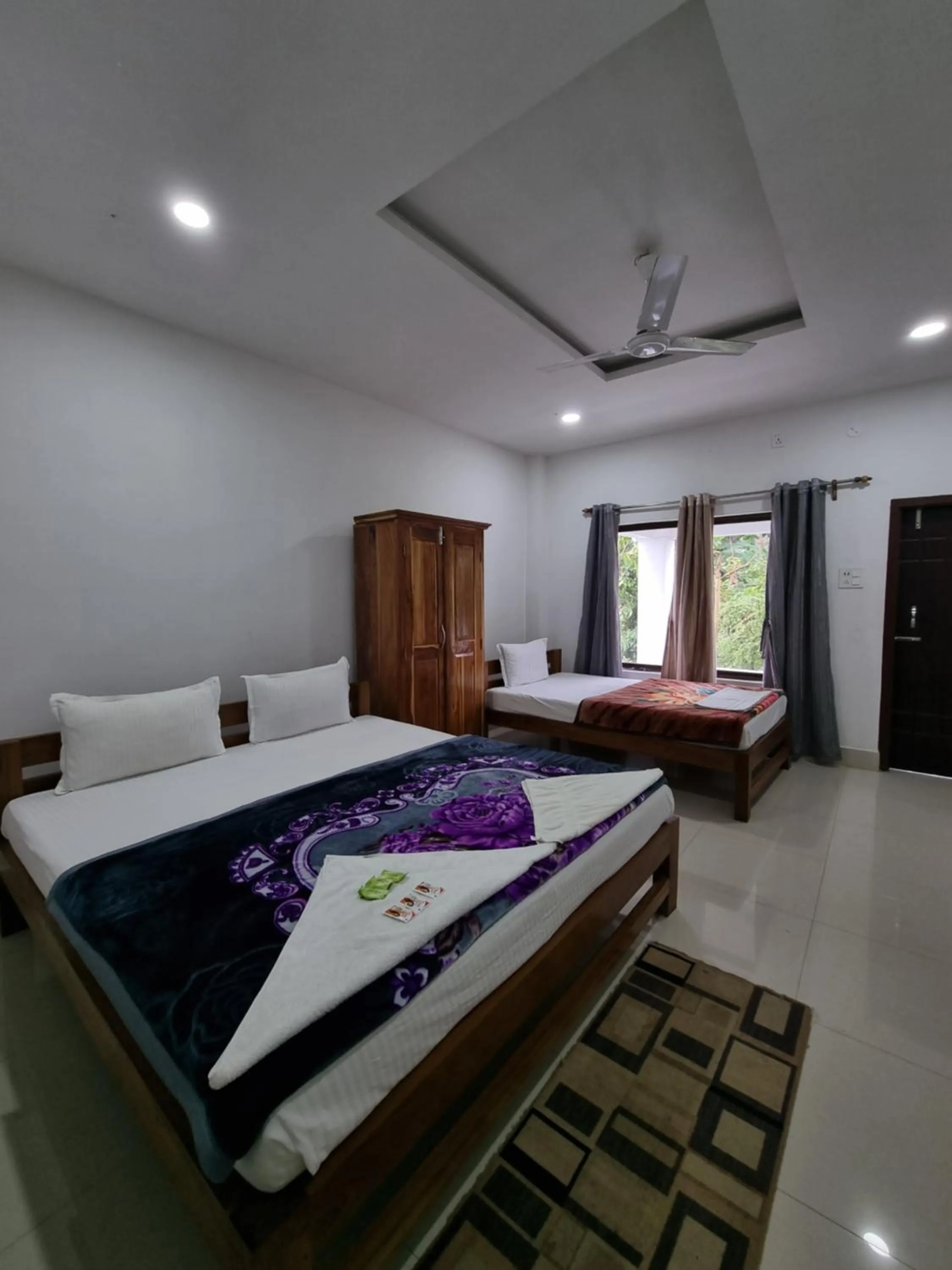 Bed in Shivaji Inn Kaziranga