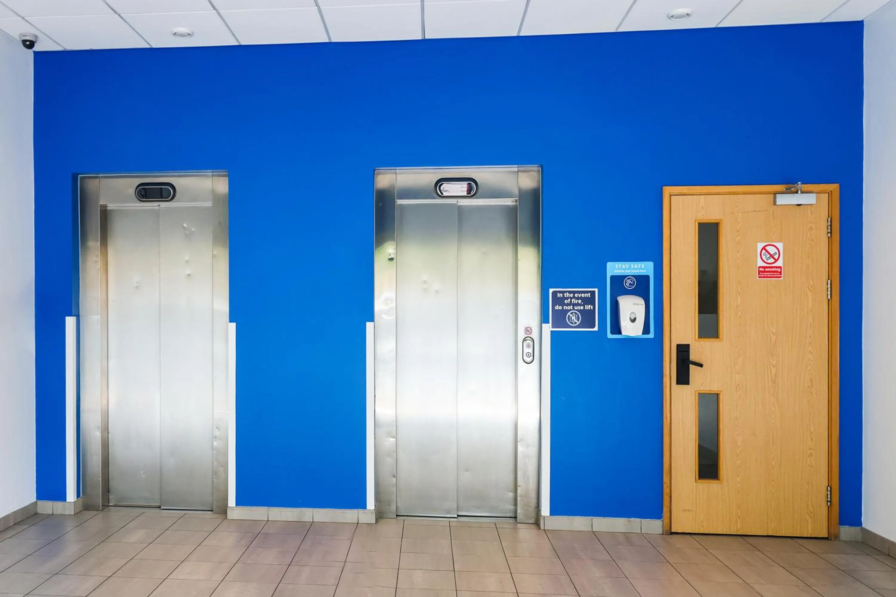 elevator in GO2 Lancaster Centre Hotel by OYO