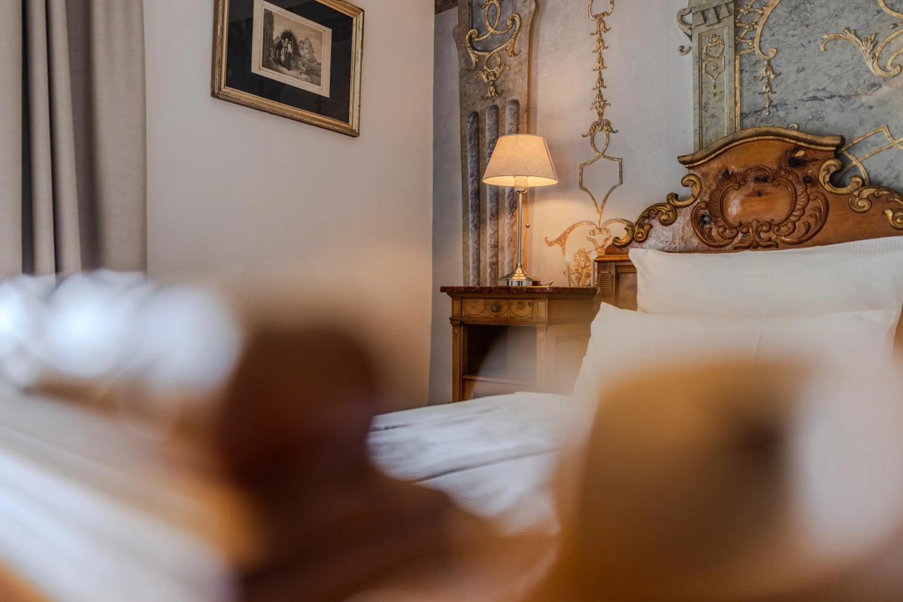 Bed in Boutiquehotel Amadeus