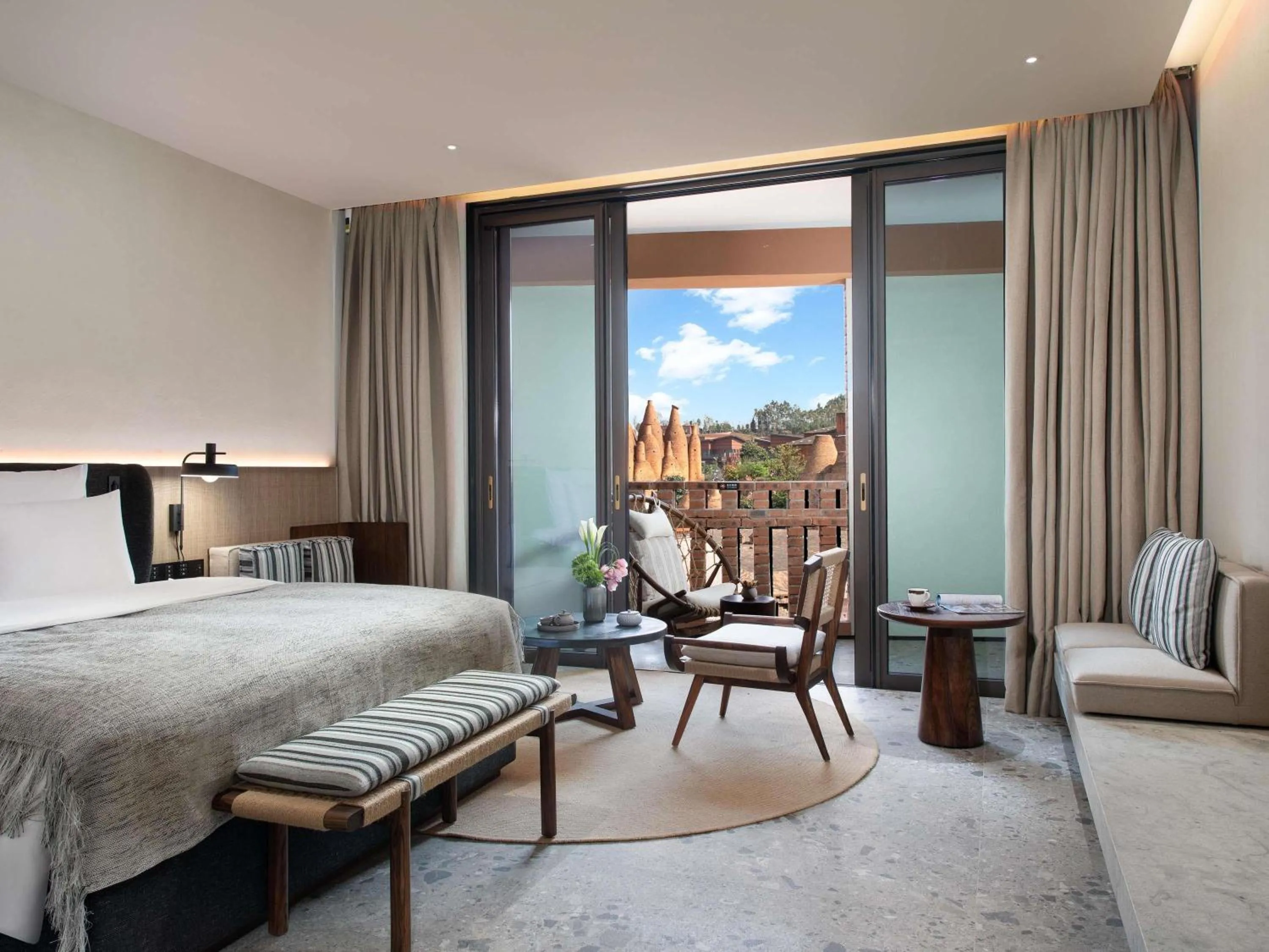 Bedroom, Bed in DongFengYun Hotel Mi'Le - MGallery Collection