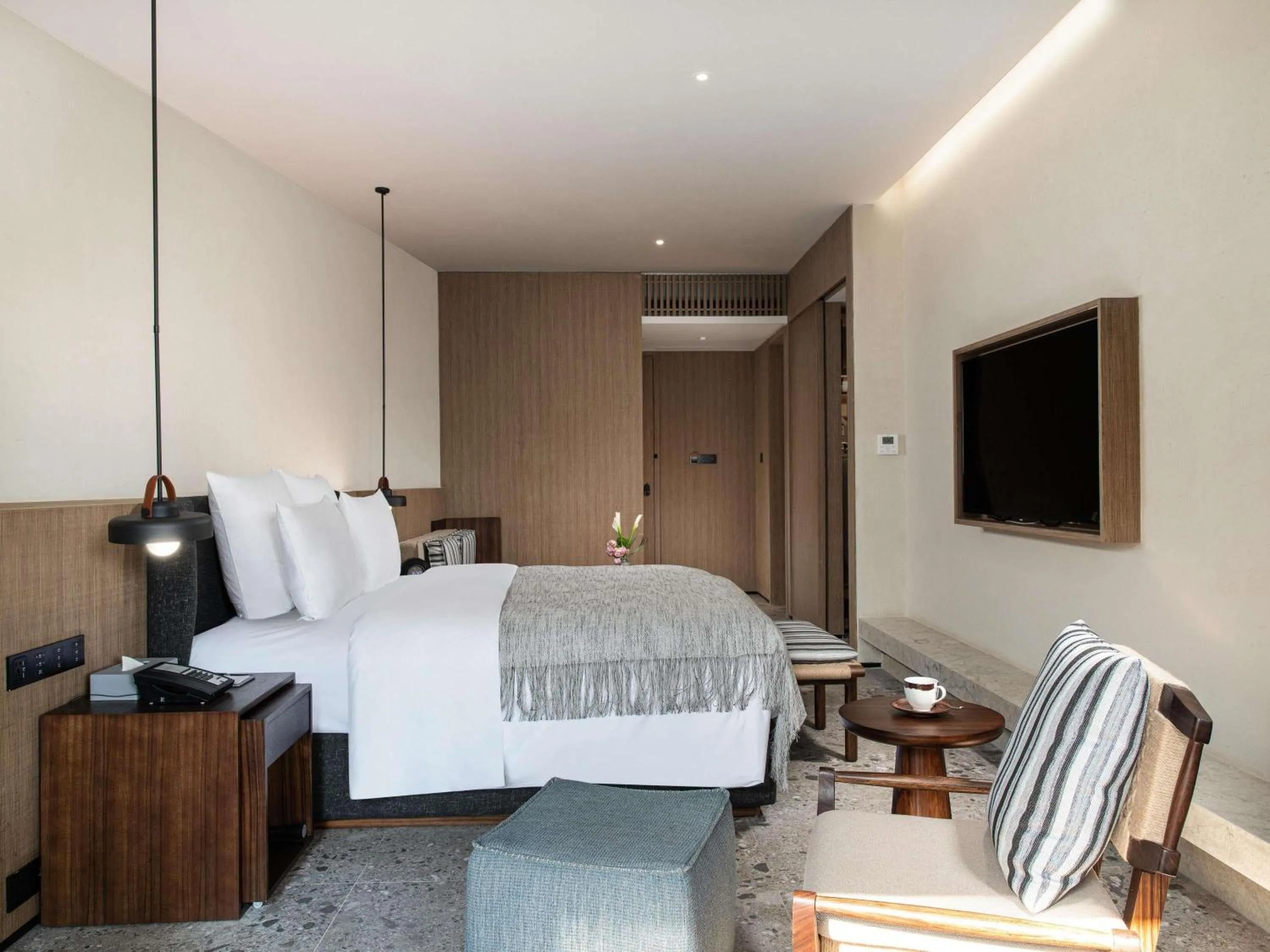 Bedroom, Bed in DongFengYun Hotel Mi'Le - MGallery Collection