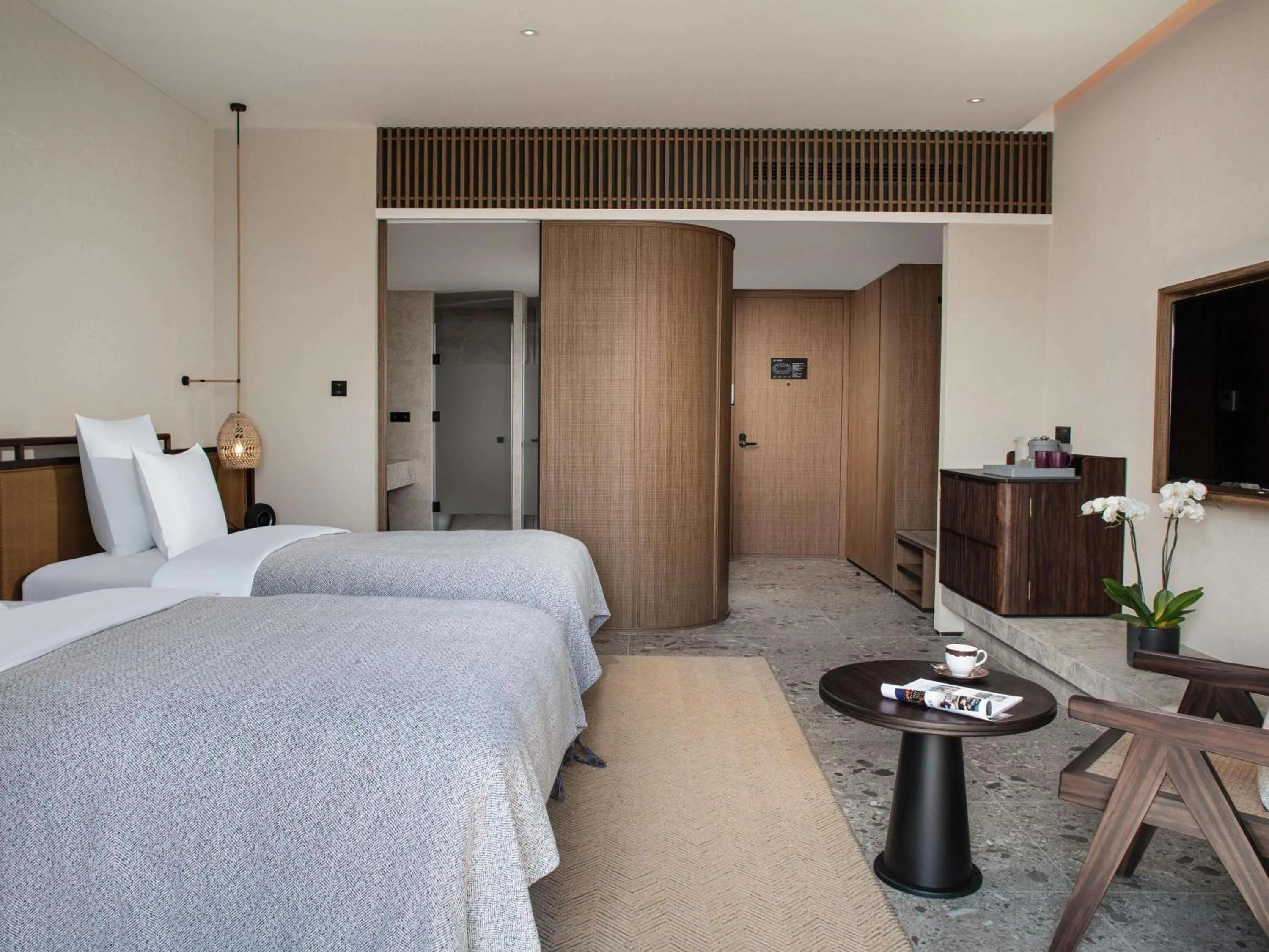 Bedroom, Bed in DongFengYun Hotel Mi'Le - MGallery Collection