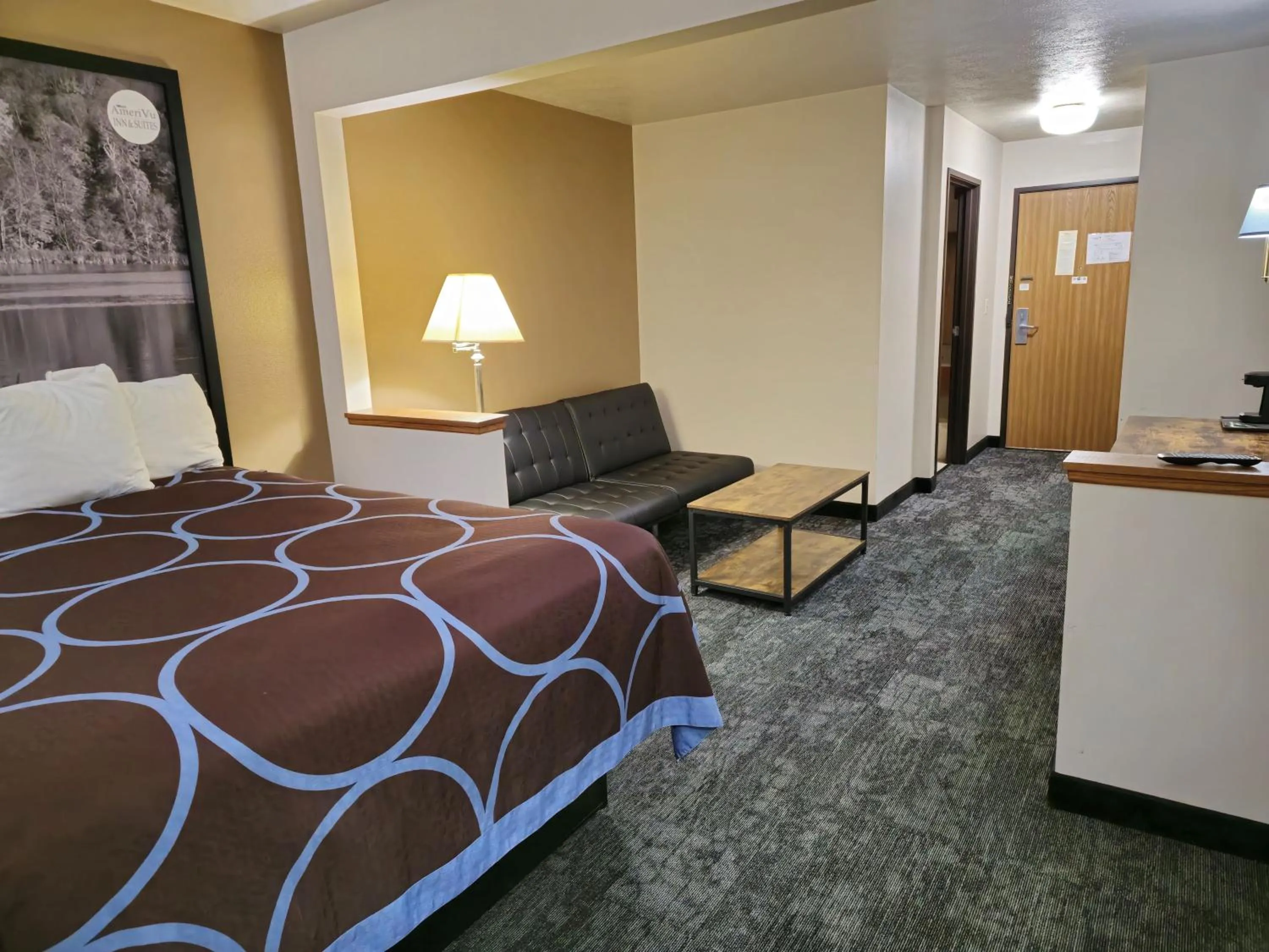 Photo of the whole room, Bed in AmeriVu Inn and Suites Shawano WI