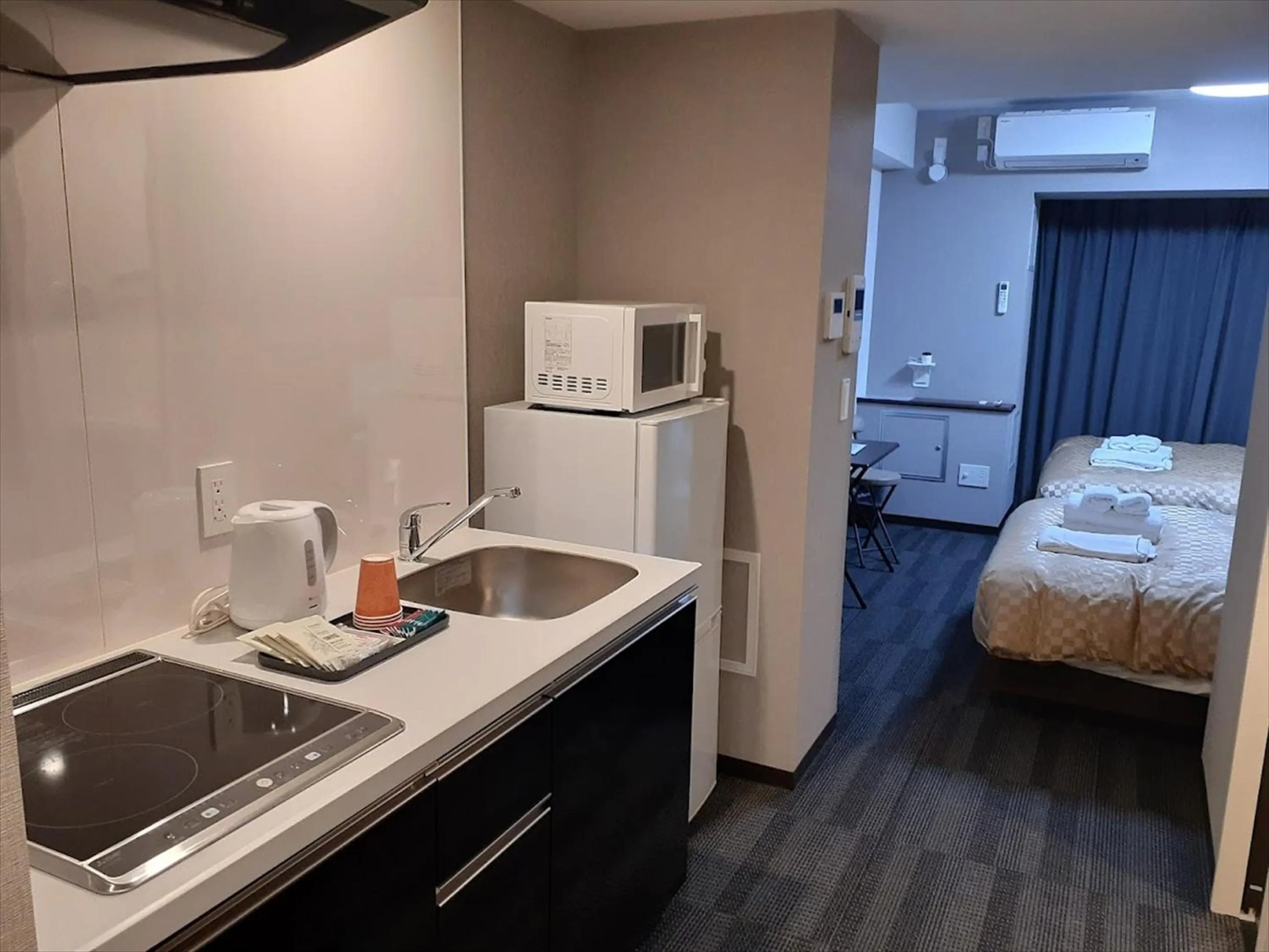 Photo of the whole room, Bed in MERBABU STAY OSAKA