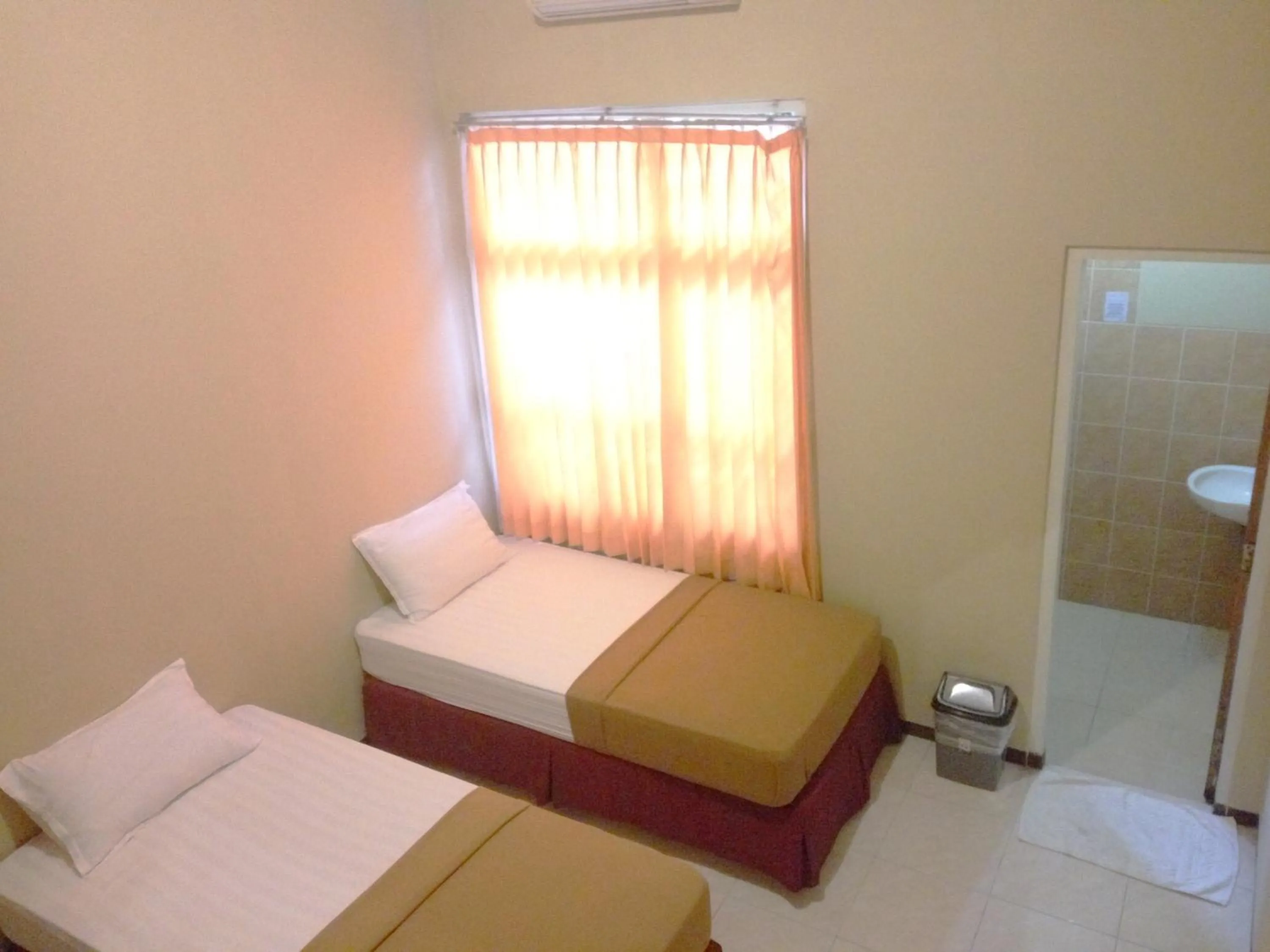 Bed in wisma sejahtera hotel