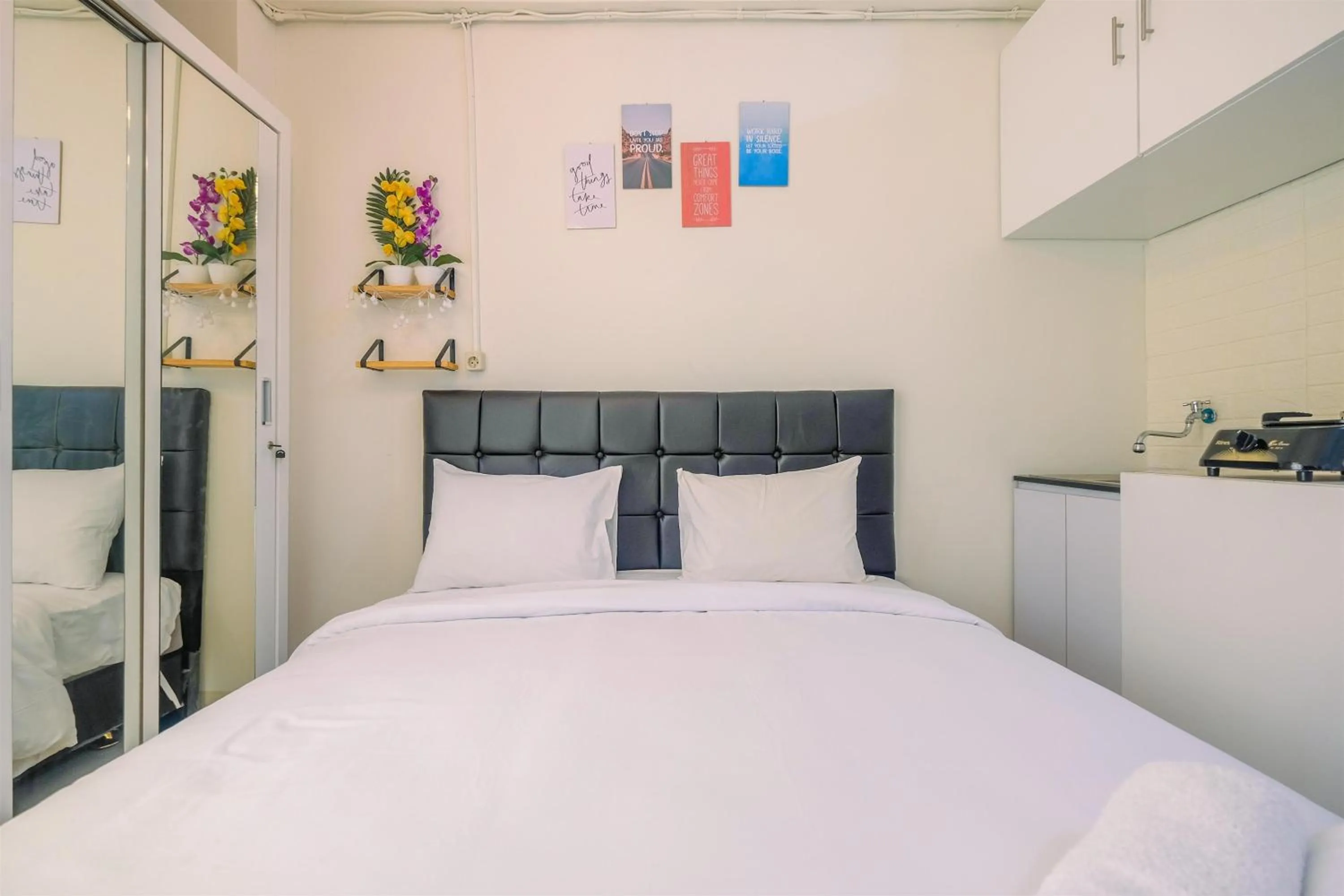 Bedroom in New Room Studio at Green Pramuka City Apartment By Travelio