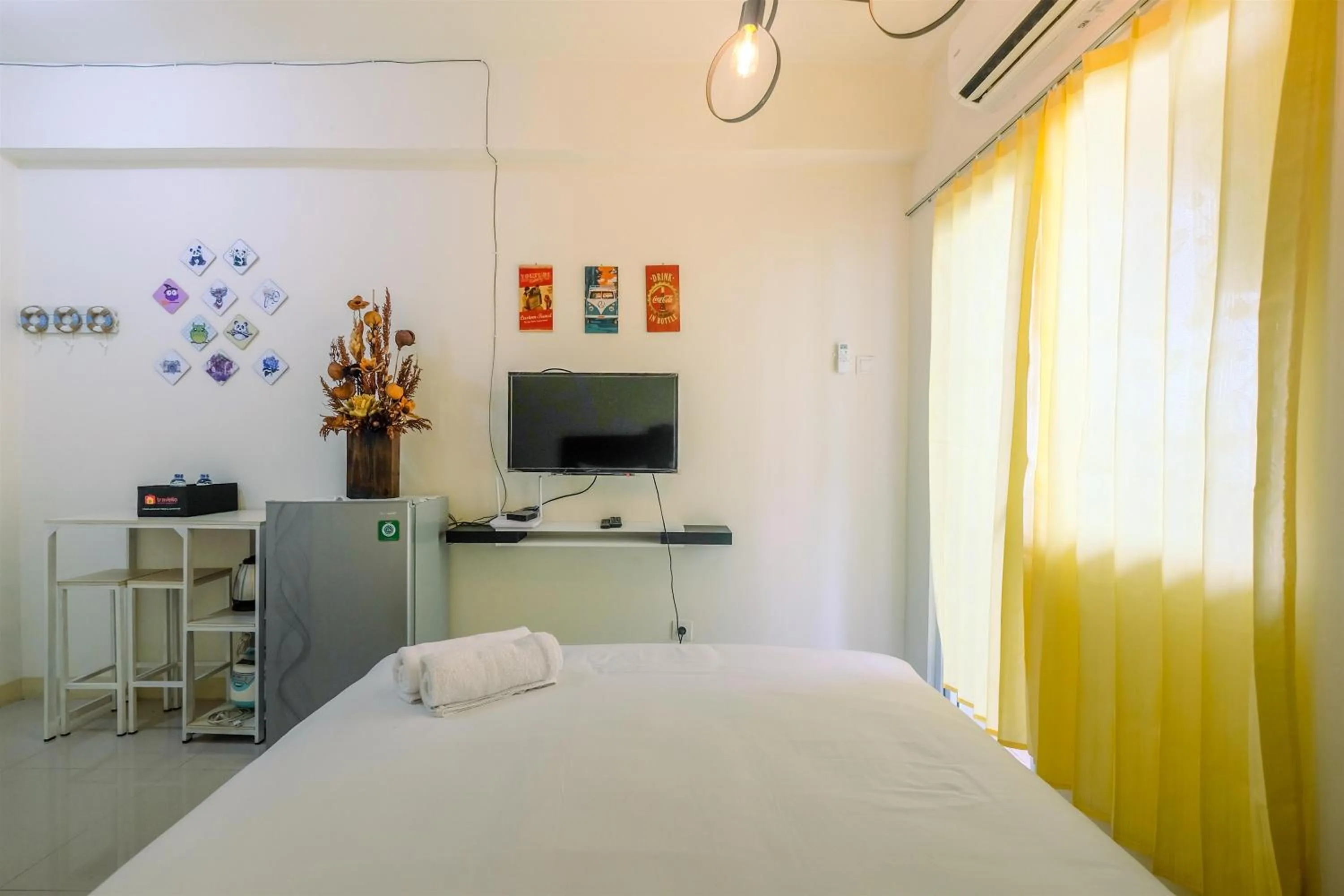 New Room Studio at Green Pramuka City Apartment By Travelio