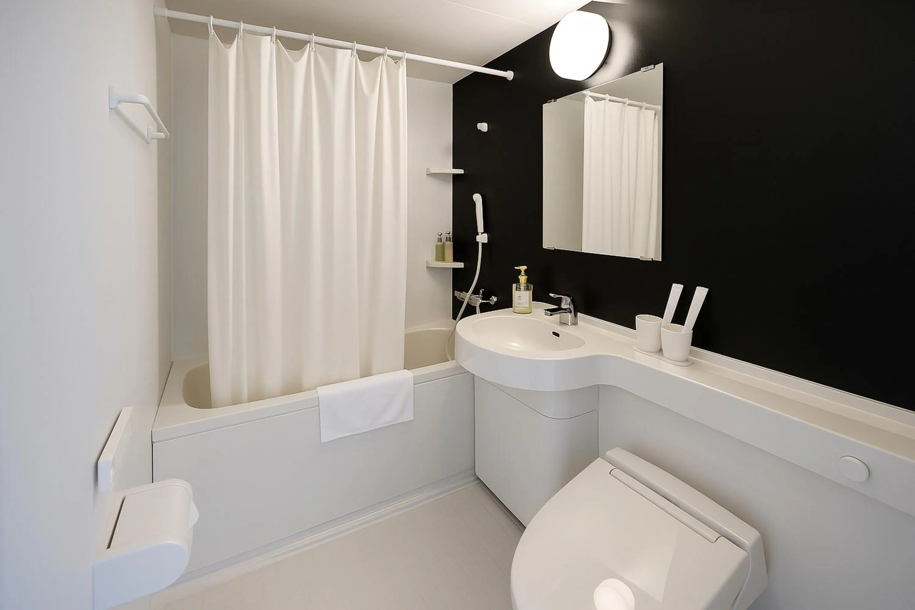 Bathroom in Plaza In Kanku Hotel