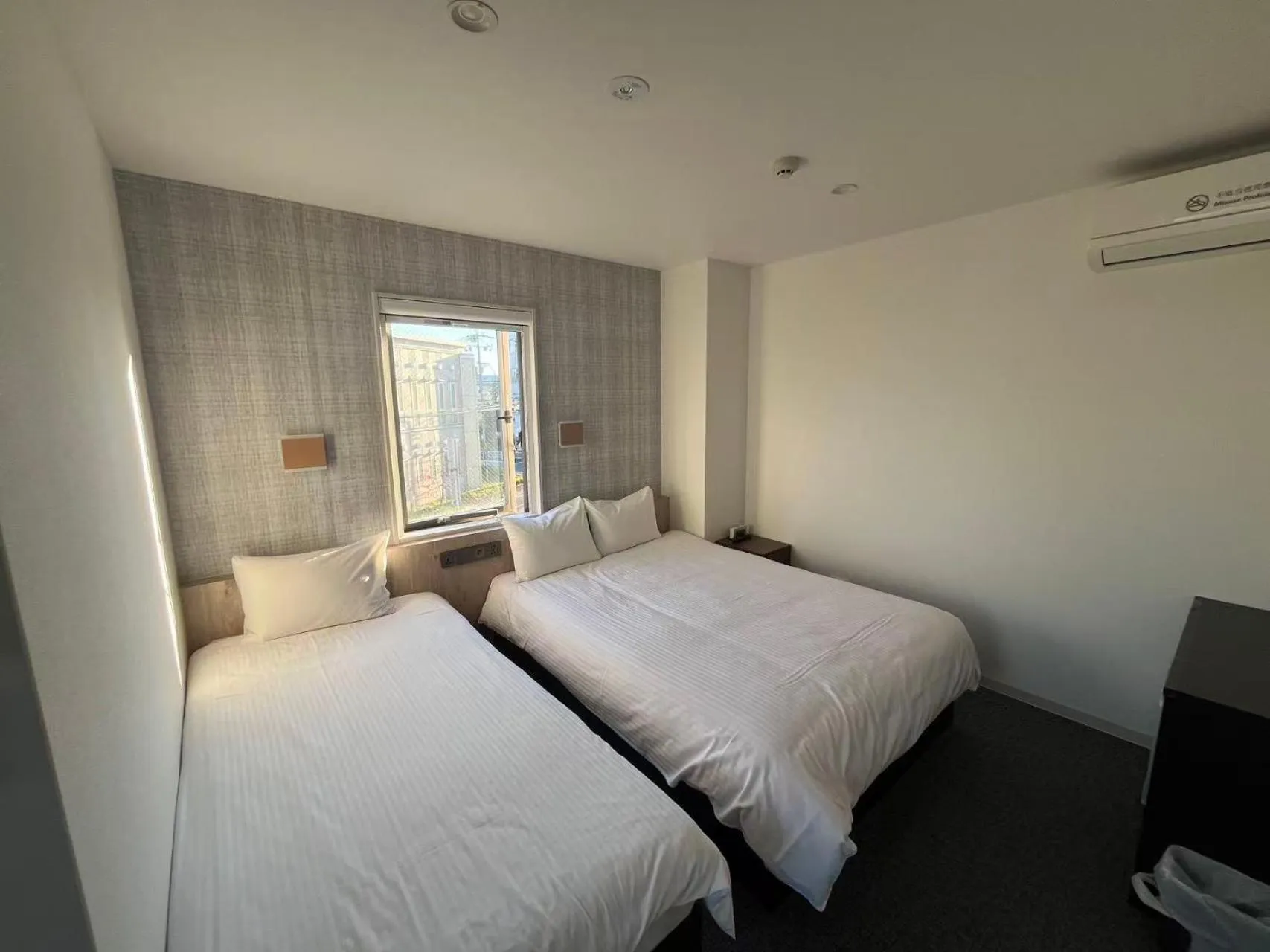 Bed in Plaza In Kanku Hotel