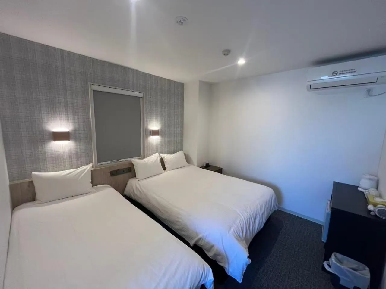 Bed in Plaza In Kanku Hotel