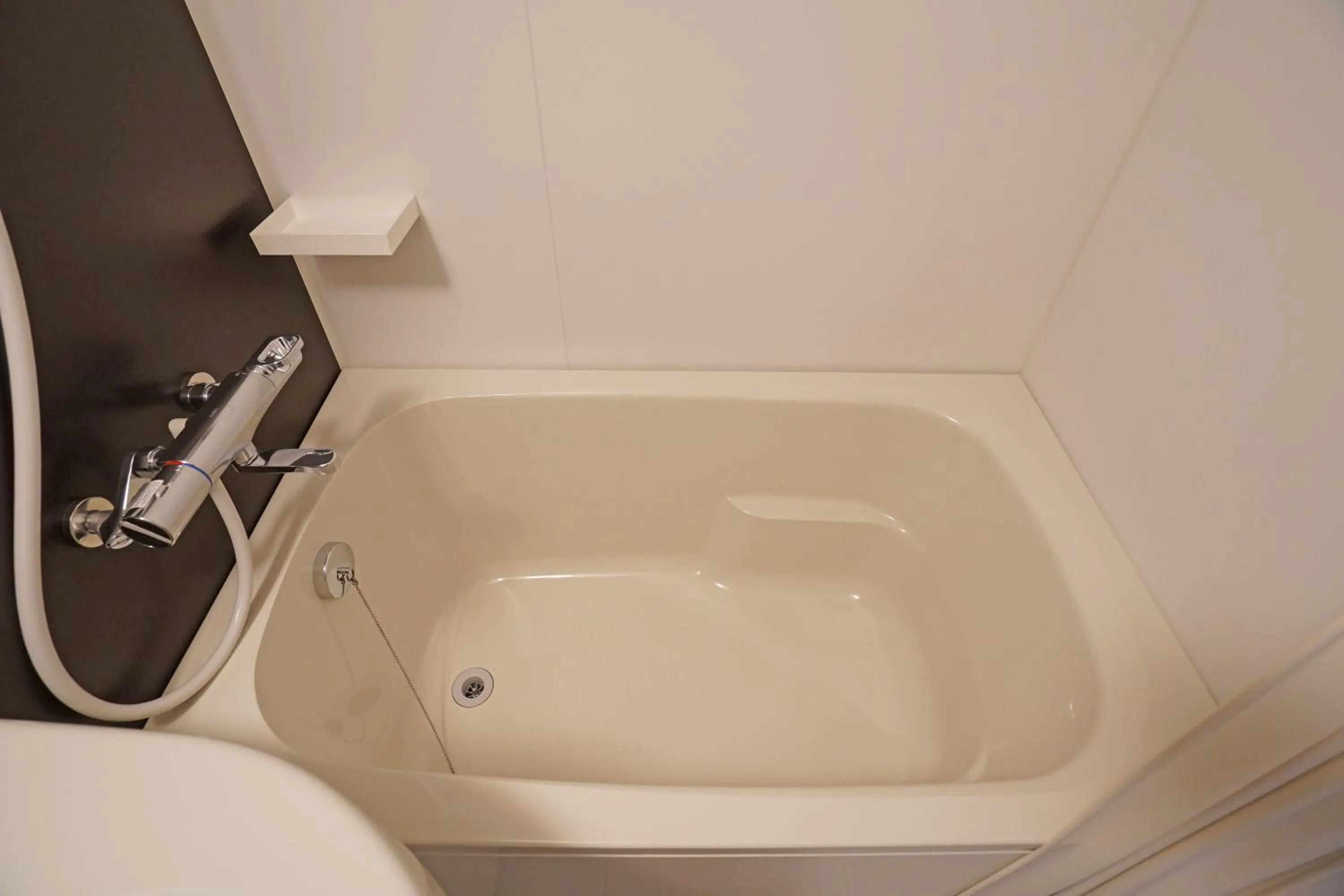 Bathroom in Plaza In Kanku Hotel