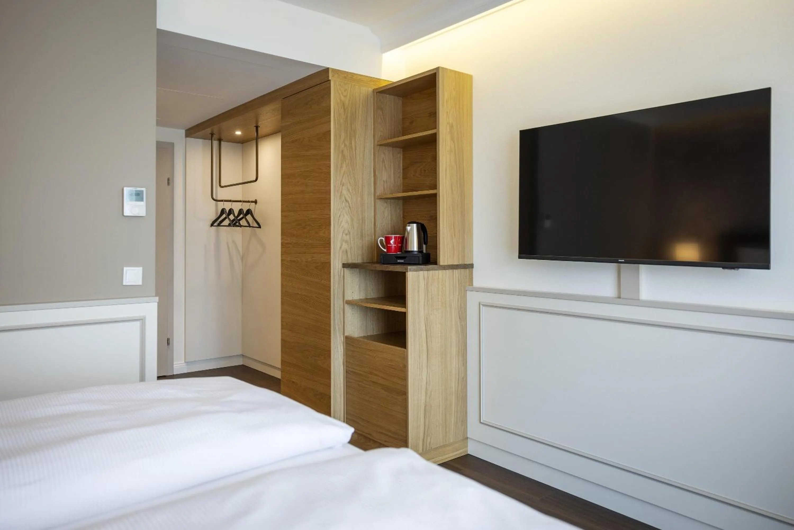 Photo of the whole room, Bed in ARCOTEL Castellani Salzburg