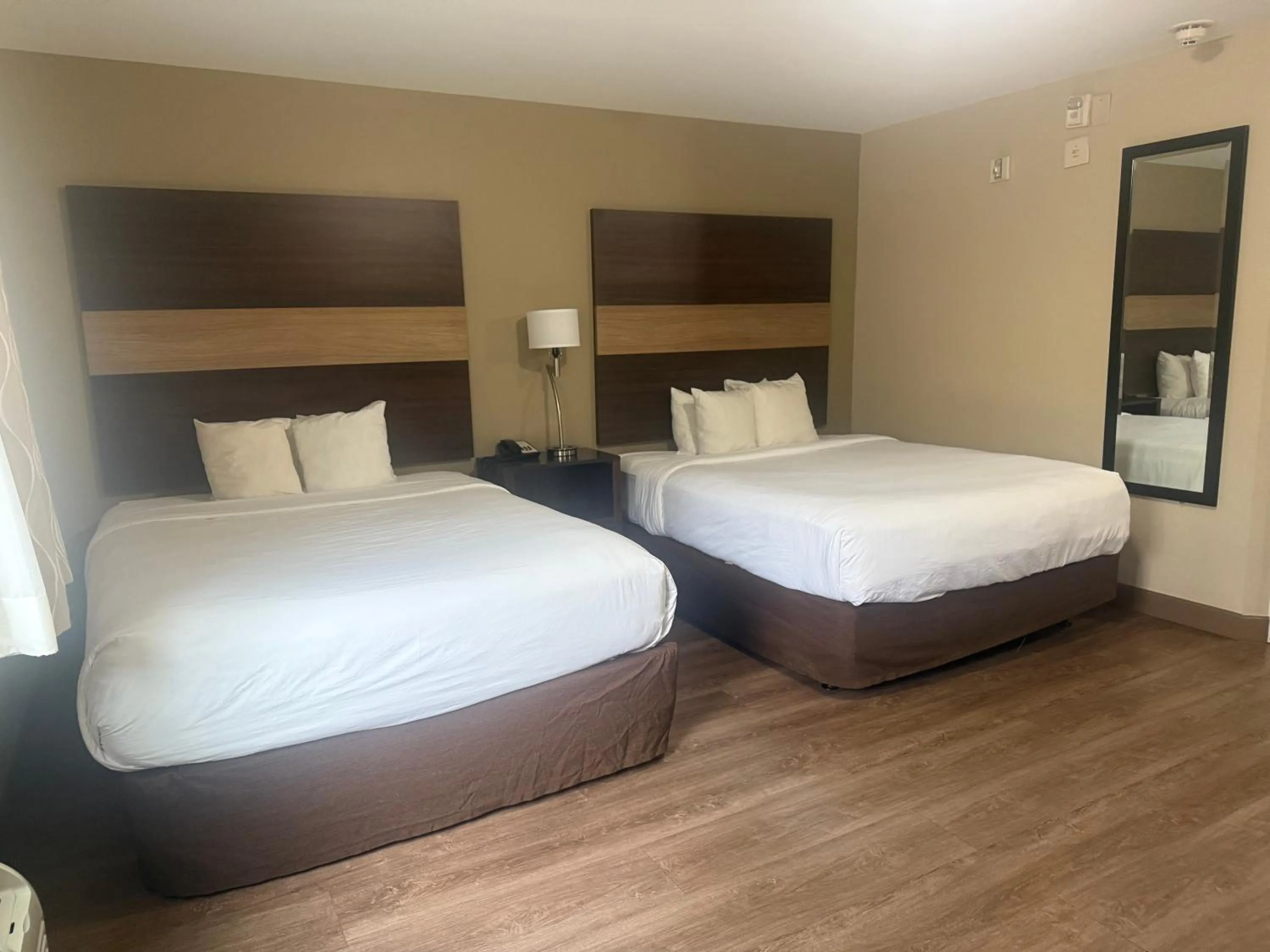 Bed in MainStay Suites Columbus near Fort Benning