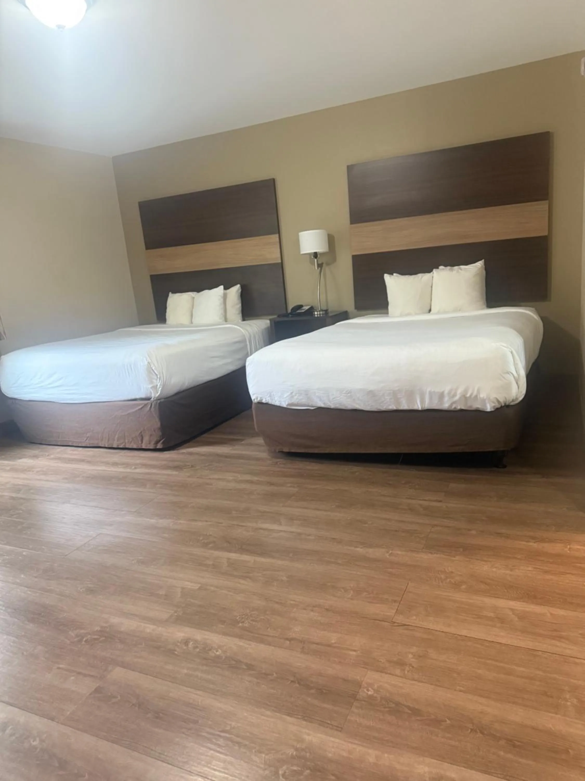 Bed in MainStay Suites Columbus near Fort Benning