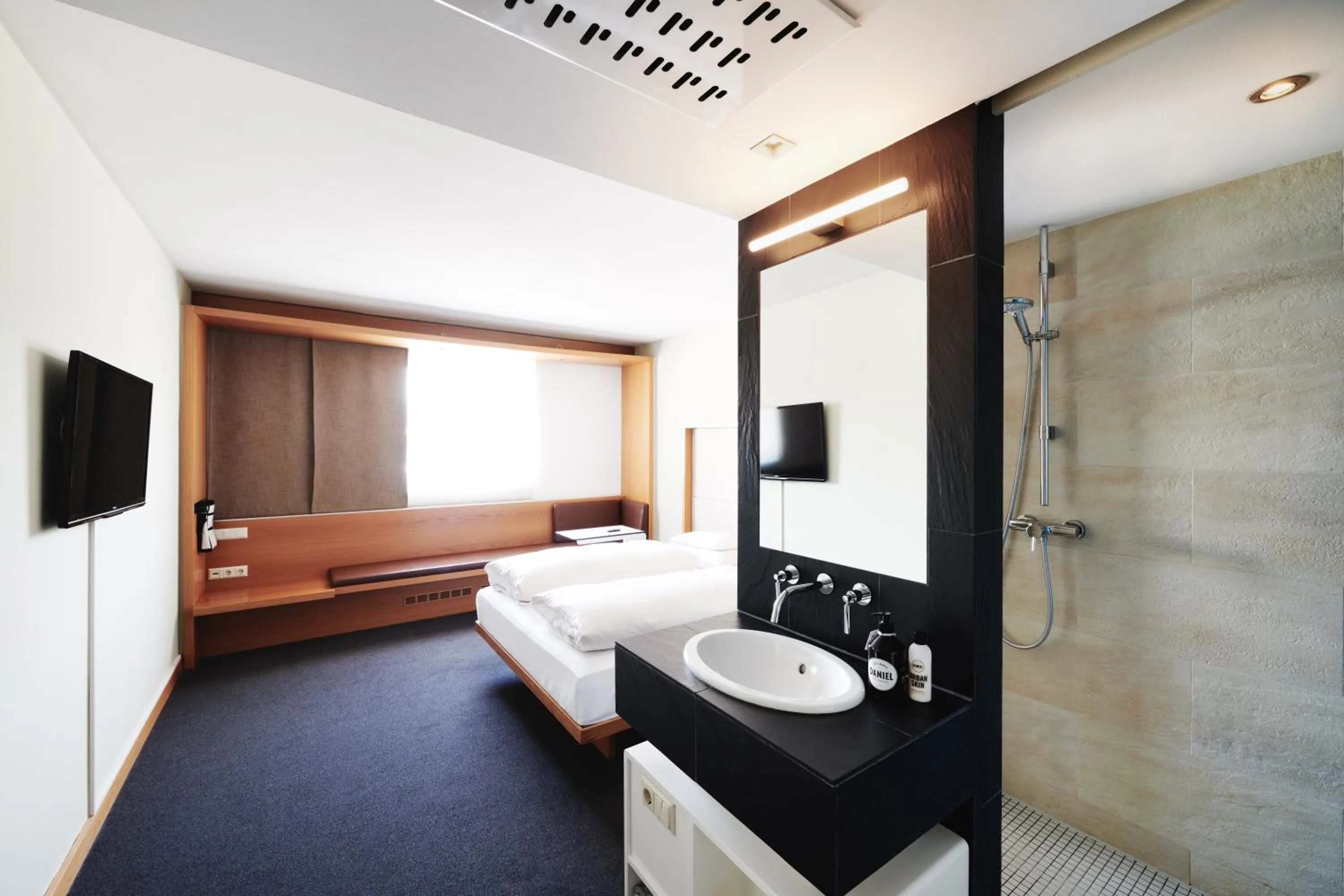 Photo of the whole room, Bed in Hotel Daniel Graz - Smart Lifestyle Near City Centre