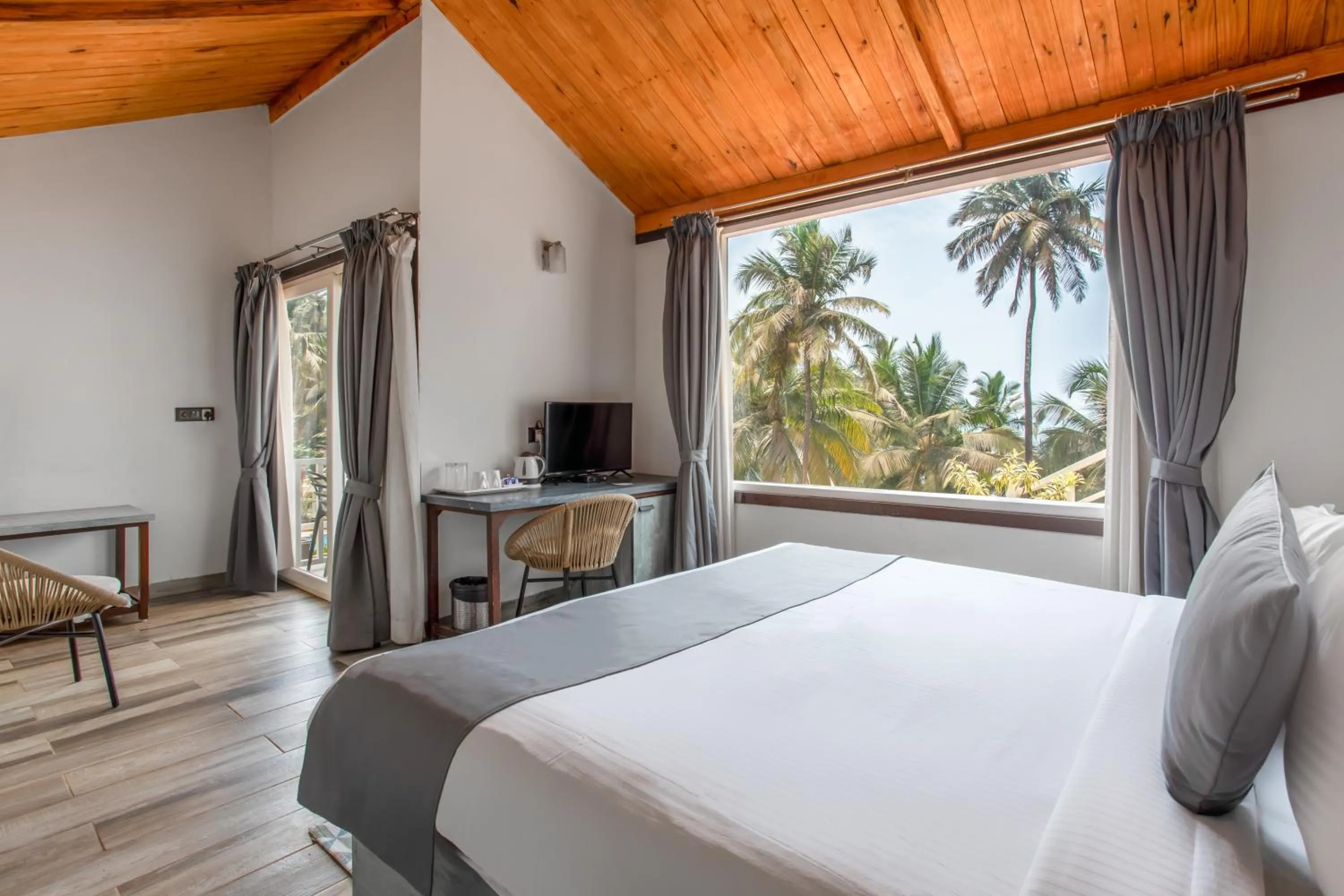 Bed in Stone Wood Beach Resort, Vagator