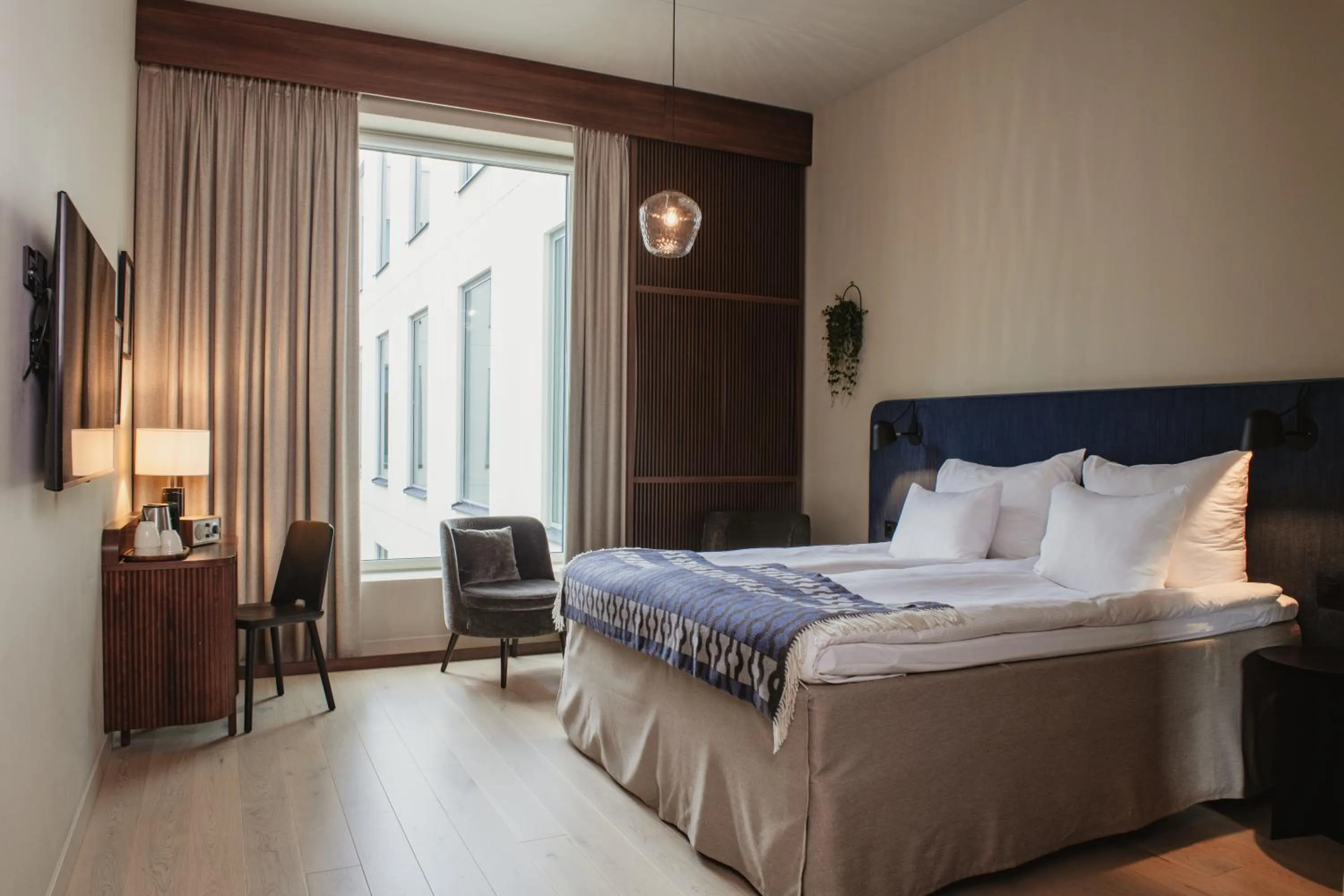 Bed in Home Hotel Tapetfabriken